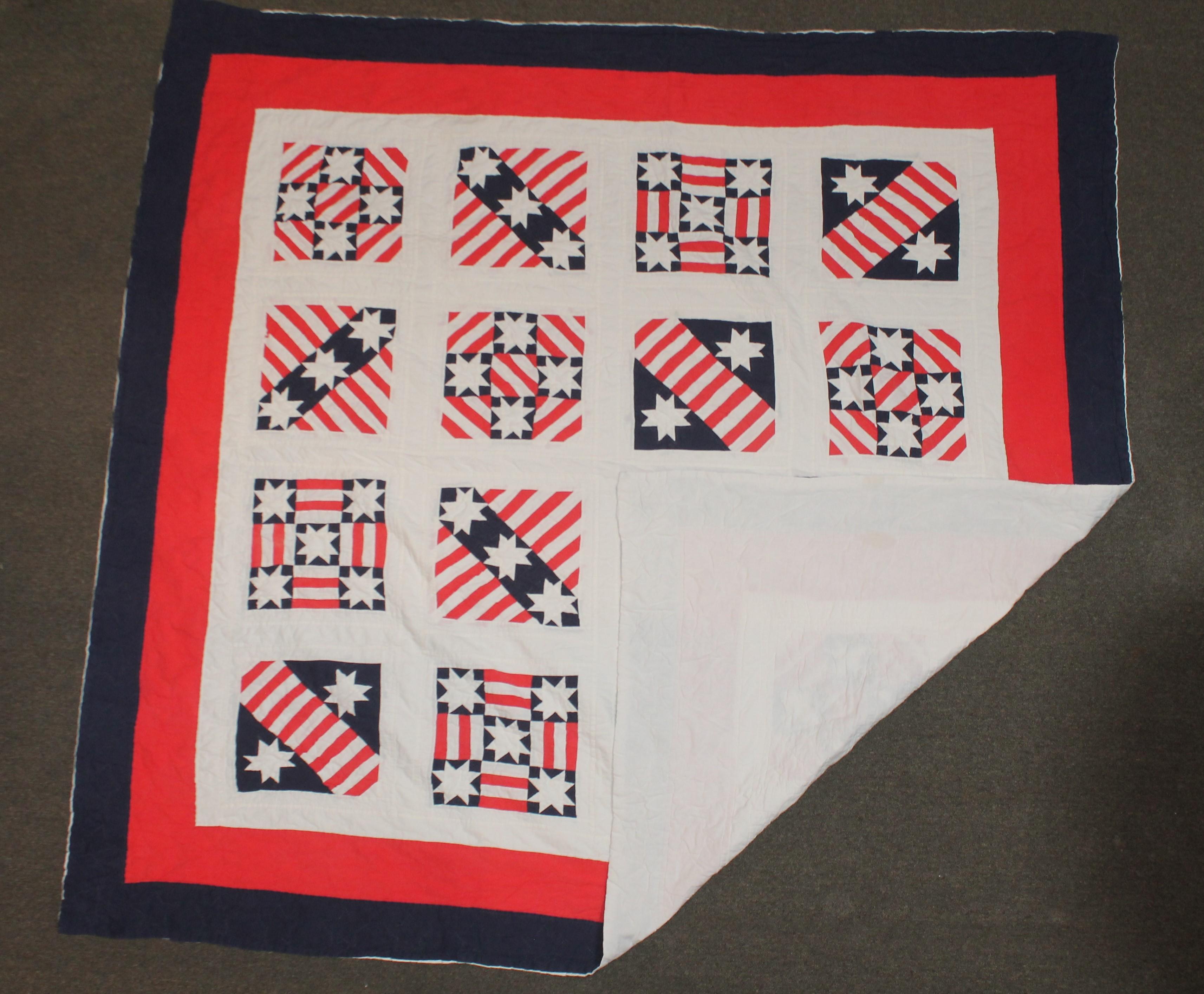 This fun patriotic red, white and blue quilt is in very good with slit fade condition in areas. It had a paper label with a signature and dated 1986. Late but great !!! A copy from the early 20th century with very nice quilting as well.