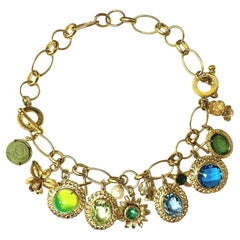 Patrizia Daliana "Charm" bracelet in 24 KT gilded bronze with glass and crystal