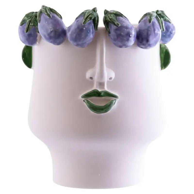 Extraordinarily crafted and decorated by hand according to the ancient Sicilian traditions of Moor's heads manufacturing, these gorgeous ceramic sculptures can be used as a flowerpot as well as a decorative objet d'art in both indoor and outdoor