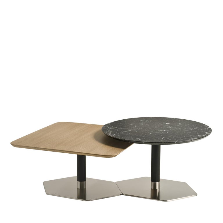 Crafted with meticulous attention to quality and detail, this set of nesting tables is part of the 
