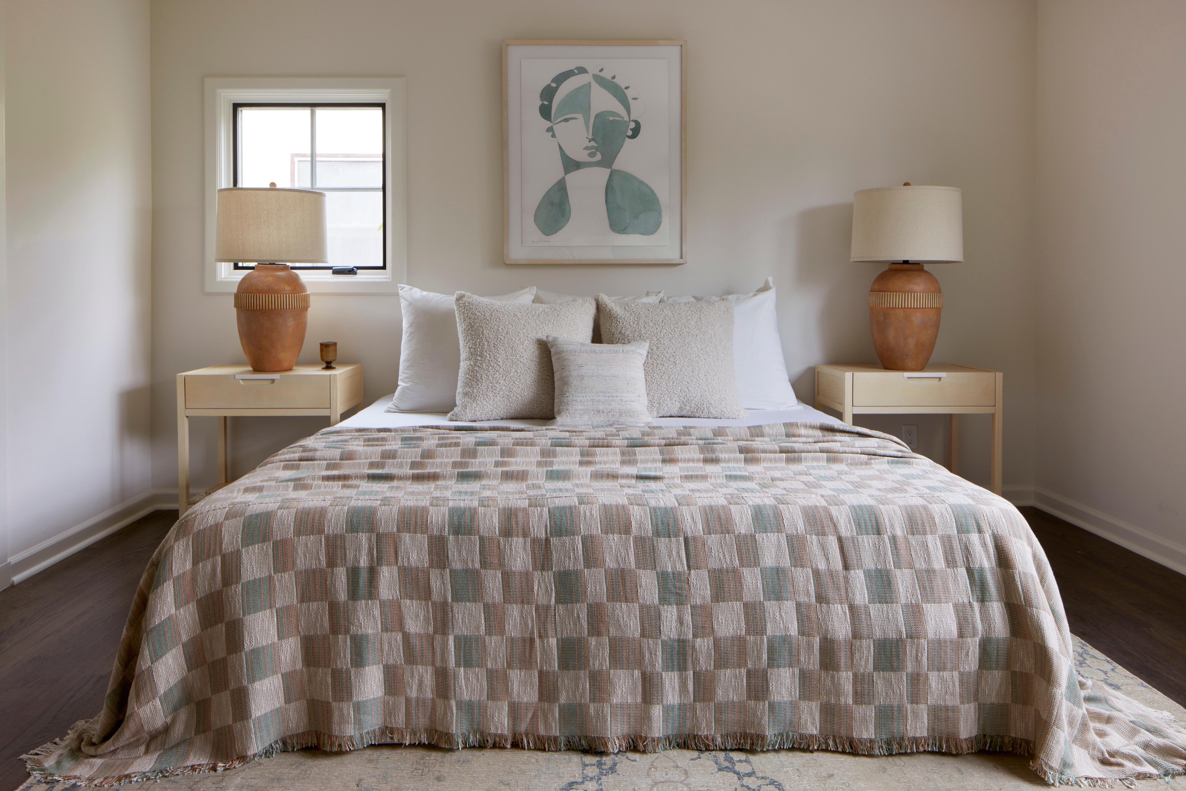 The 'Mariana' bedspread is designed by Folk Textiles—a LA based brand dedicated to thoughtful living. This textile is woven in the UK using sustainably-dyed organic cotton from Italy. 

The 'Mariana' pattern in particular is inspired by oceanic