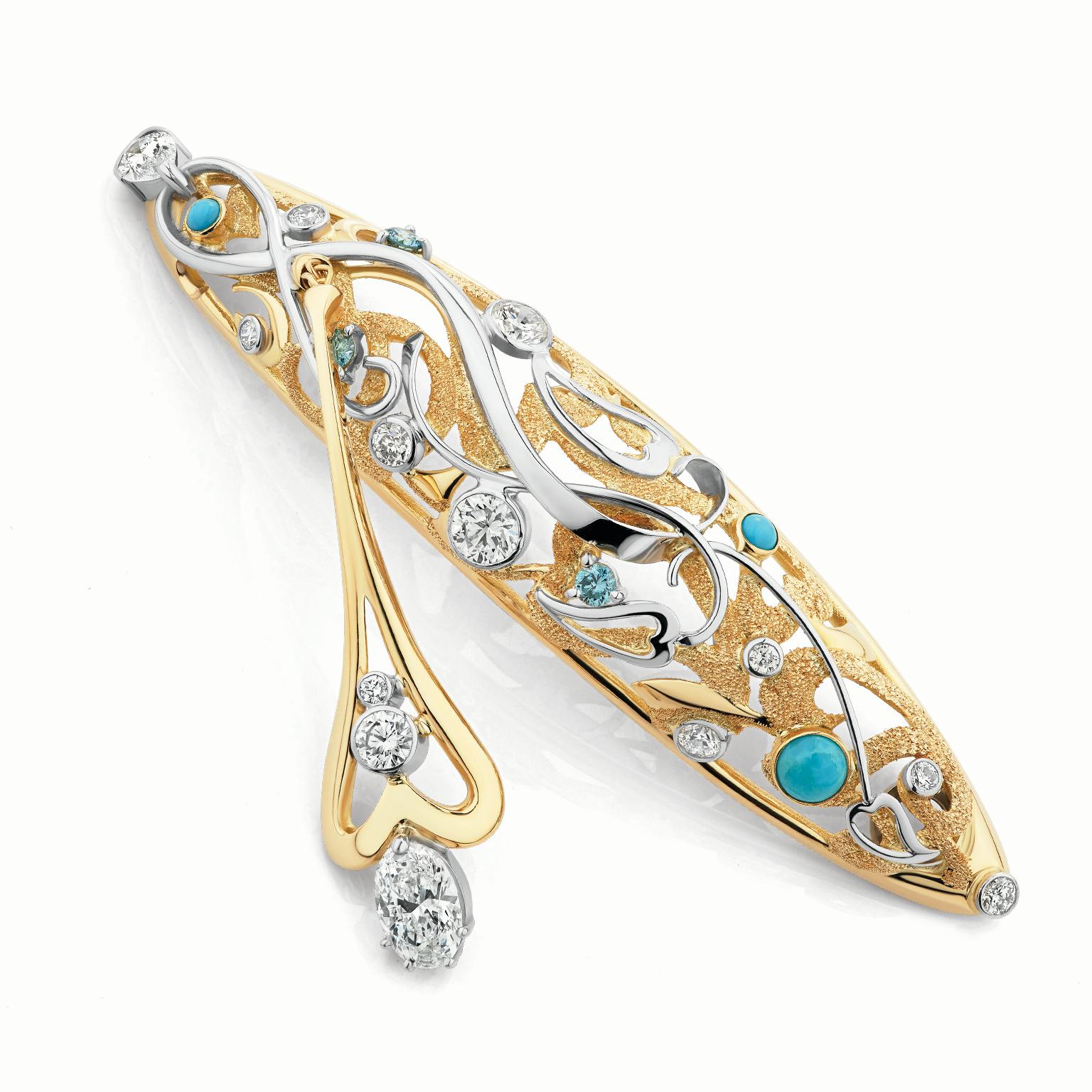 Paul Amey’s “Honeymoon” pendant was crafted from 18K yellow gold and platinum with diamonds and turquoise. The pendant contains an oval 72pt FSI2 diamond GIA Certificate, a 32pt pear shape E/F VS SI1 diamond and a range of round white E/F VS SI1