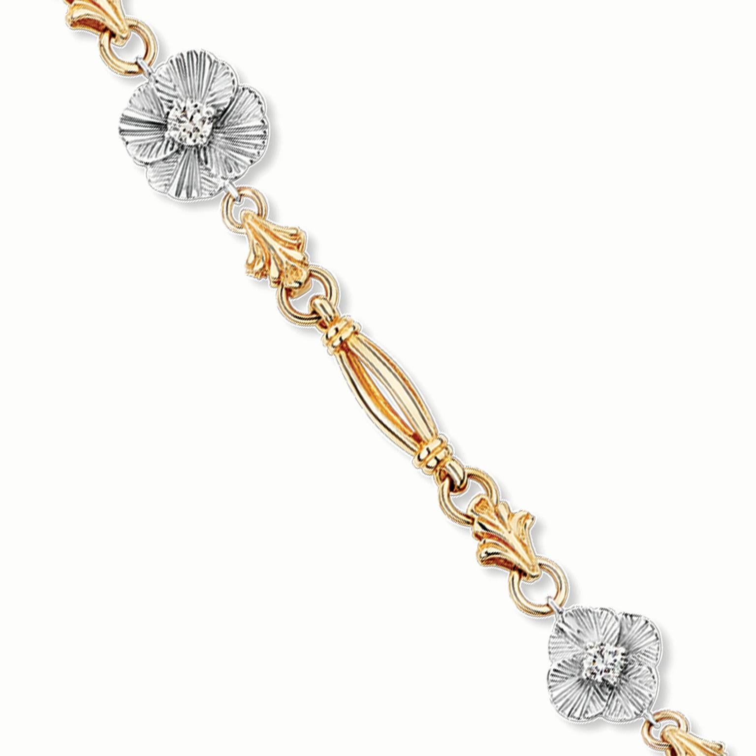 Paul Amey’s “Jasmin” shoulder (bra) strap is made in 9K yellow gold, silver and diamonds. The “Jasmin” flowers are solid silver with a small flower at each end with a 25pt round white diamond in each center and two larger flowers in the middle with