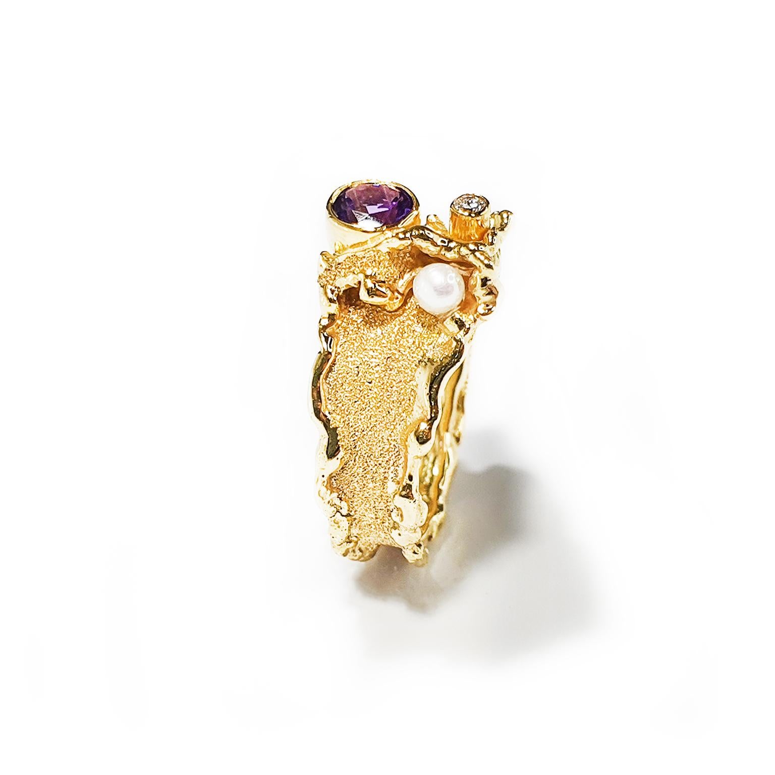 Paul Amey's 9K yellow gold diamond, pearl and amethyst ring features a 3pt diamond, a small round pearl and a 12mm round amethyst. The amethyst ring is finished with Paul Amey's signature Molten Edge finish. The ring has a total weight of 4.3 grams