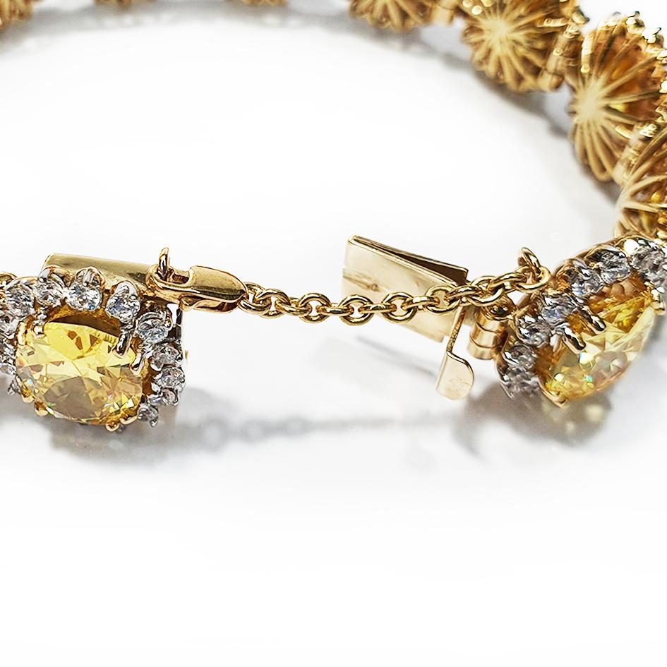Mixed Cut Paul Amey 9k Gold with Yellow and White Swarovski Crystal Bracelet For Sale