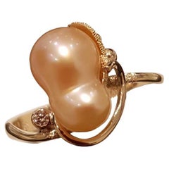 Paul Amey Apricot Perlenring aus 9 Karat Gelbgold mit Diamant
