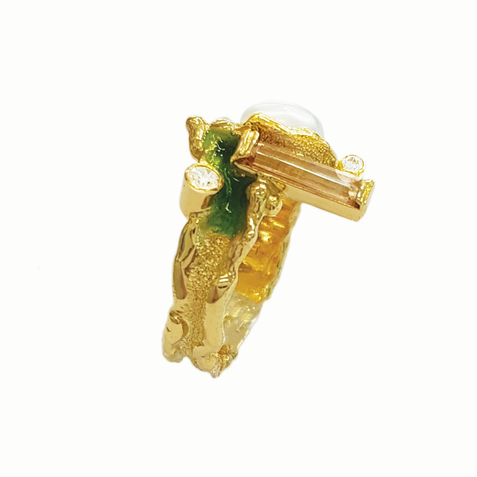 Indulge in the opulent charm of Paul Amey’s Signature Molten Edge Natural Baguette Imperial Topaz, Diamond, and Pearl Ring – a true testament to luxury and craftsmanship, meticulously fashioned from 18K yellow gold.

This captivating ring boasts a