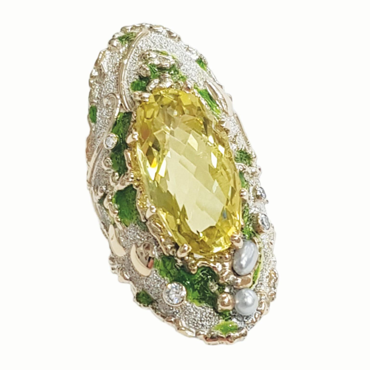 Paul Amey’s “Lemon Sherbet” ring is a totally unique and completely handcrafted and created by Paul Amey. This signature molten edge natural yellow quartz, diamond and pearl ring was crafted from Sterling Silver with 9K yellow gold and green enamel.