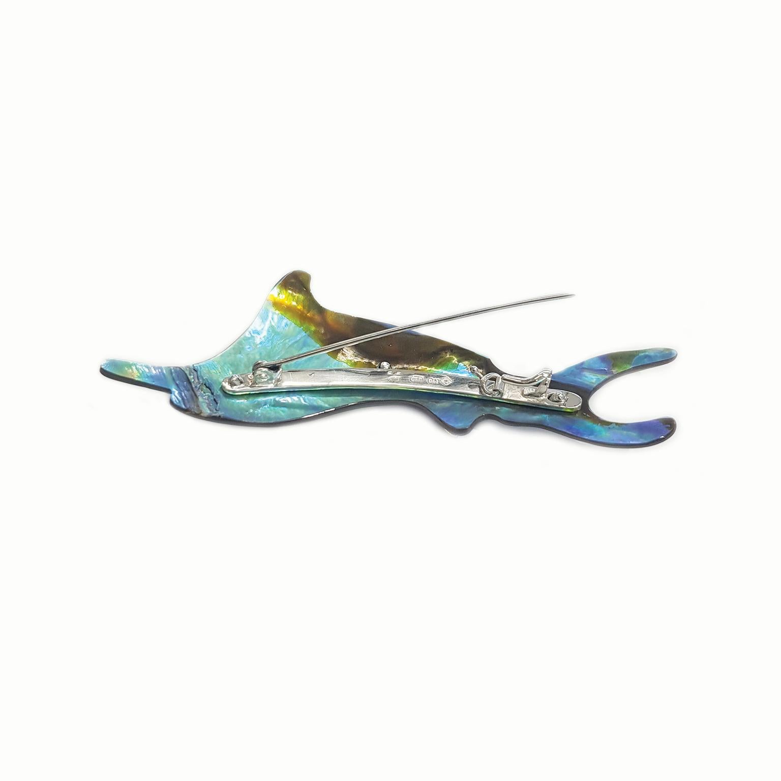 The Marlin Brooch is a totally unique and completely handcrafted and created by Paul Amey, including the fitting.  The Marlin Brooch was crafted from tarnish resistant Sterling Silver with 9K yellow gold fin and tail highlights and hand carved Paua