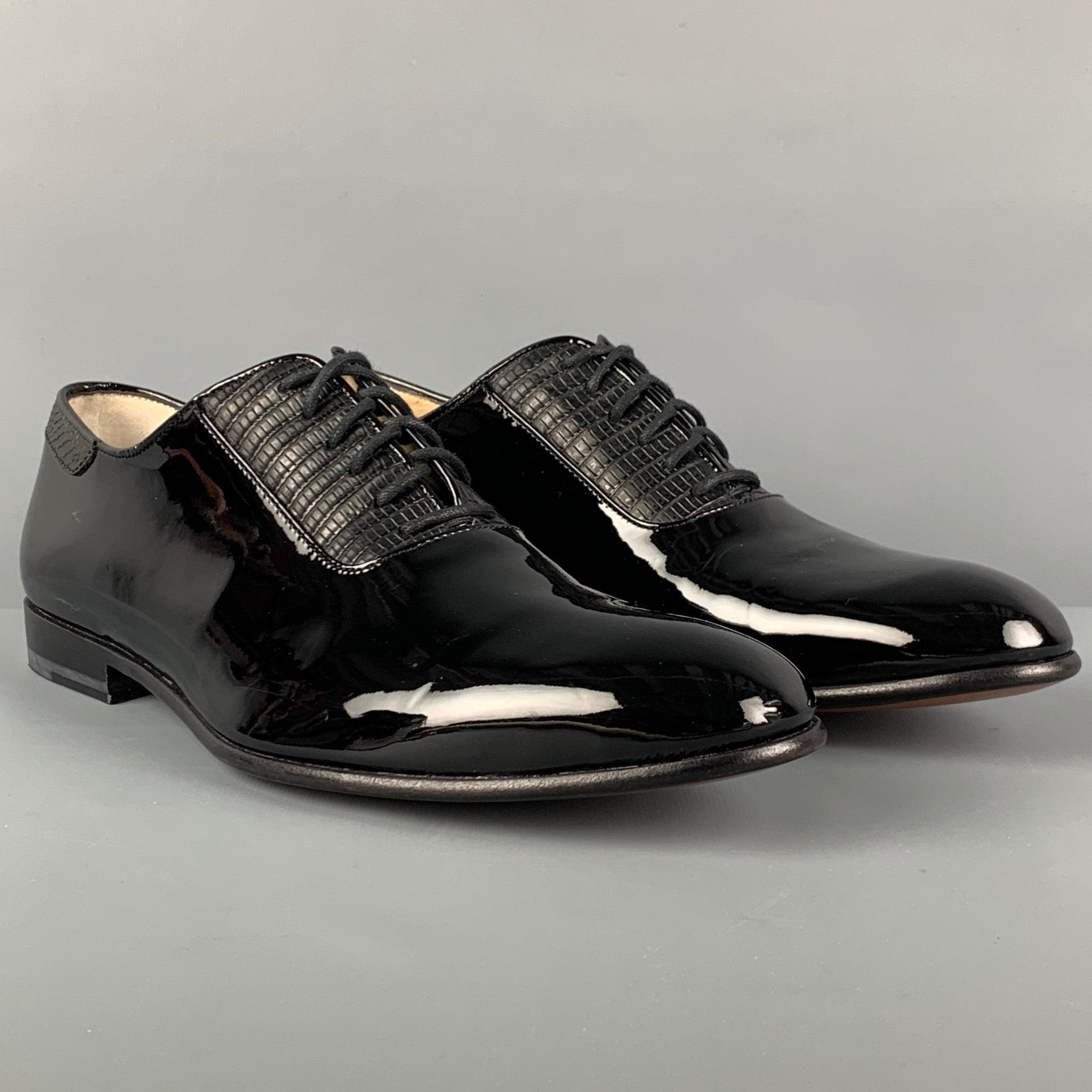 PAUL ANDREW dress shoes comes in a black patent leather with a leather panel featuring a round toe and a lace up closure. Made in Italy.
Very Good
Pre-Owned Condition. 

Marked:   43Outsole: 12 inches  x 4 inches 
  
  
 
Reference: 117689
Category: