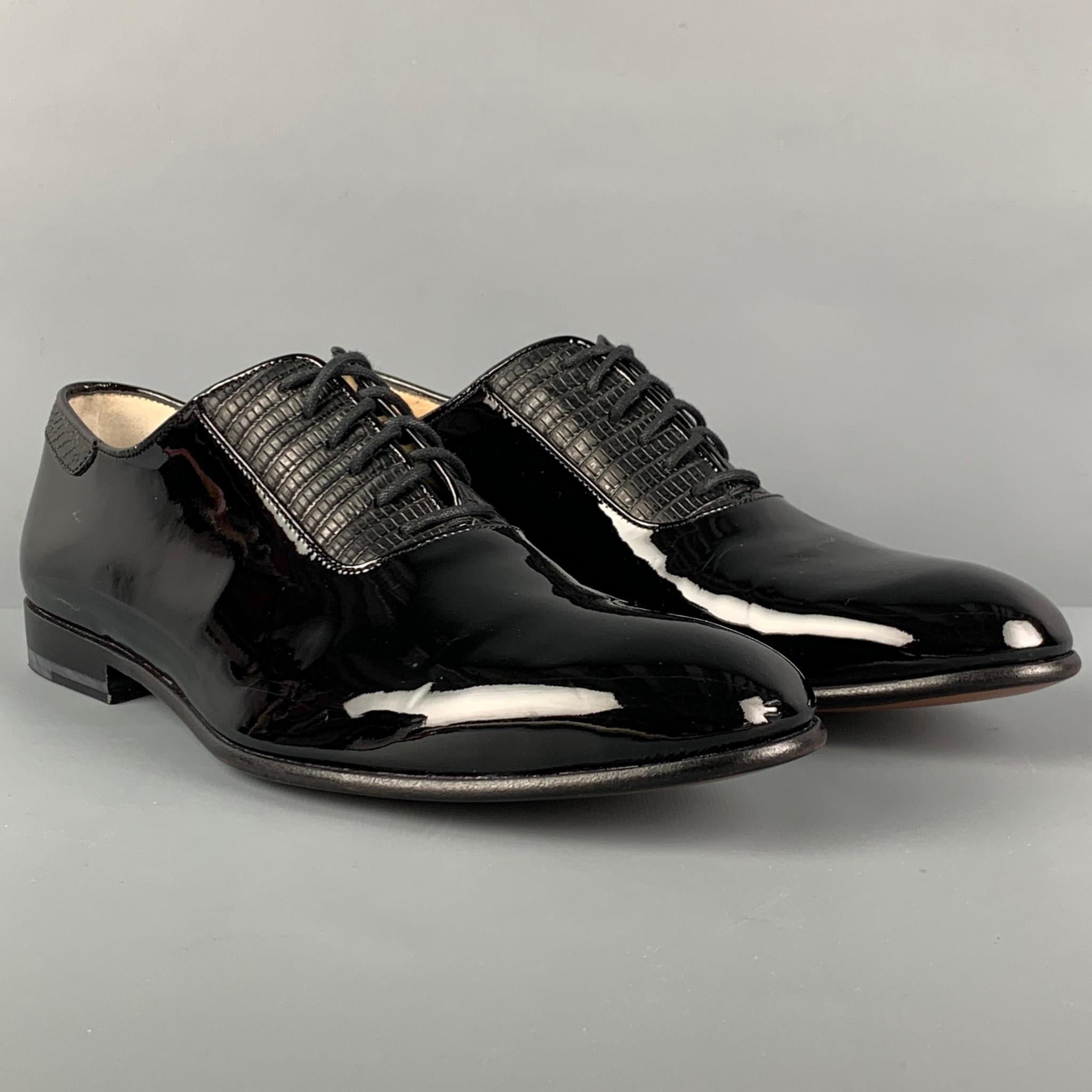 PAUL ANDREW dress shoes comes in a black patent leather with a leather panel featuring a round toe and a lace up closure. Made in Italy. 

Very Good Pre-Owned Condition.
Marked: 43

Outsole: 12 in. x 4 in. 