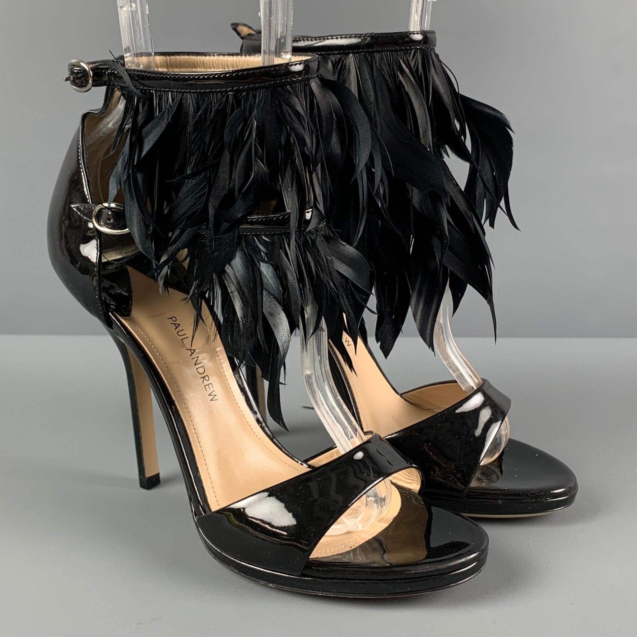 PAUL ANDREW sandals comes in a black patent leather featuring a double feather strap design, open toe, and a stiletto heel. Made in Italy.
New Without Tags.  

Marked:   36 

Measurements: 
  Heel: 4.5 inches  
  
  
 
Reference: 120965
Category: