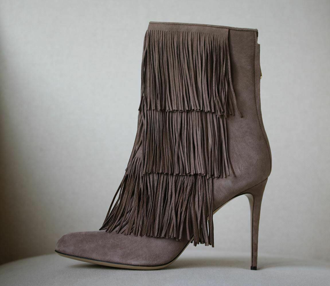 The western boot is one of this season's most covetable styles. Crafted in italy from taupe suede. Paul Andrew gives this fringed pair a sophisticated spin with a pointed toe and a pin-thin heel. Heel measures approximately 95mm/ 4 inches. Taupe