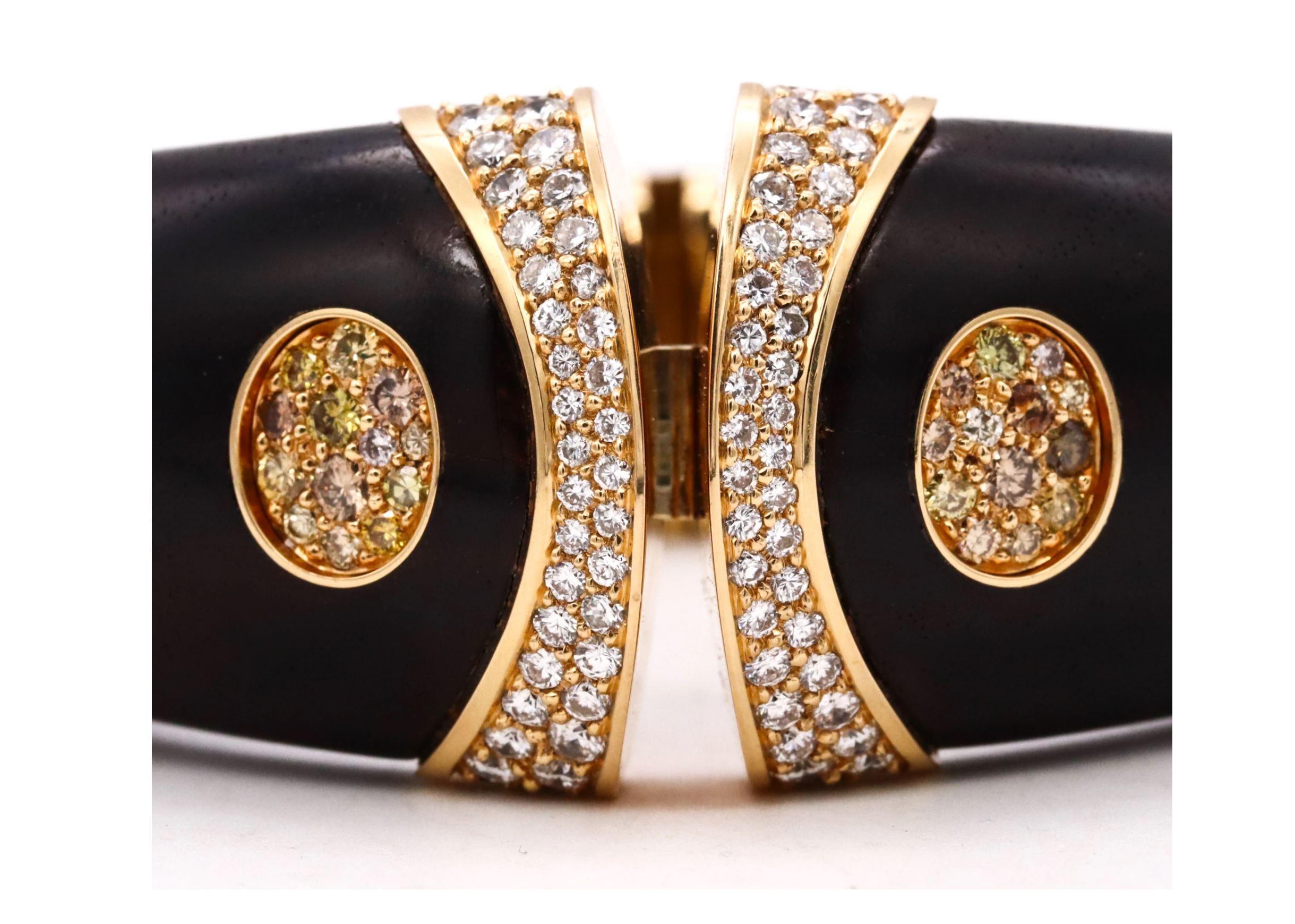 Beautiful statement piece made in Zurich Switzerland, back in the 1970's. This is a one-of-a-kind bracelet carefully crafted by Paul Binder itself in solid 18 karats of polished yellow gold and is suited with a hinged tension mechanism with an