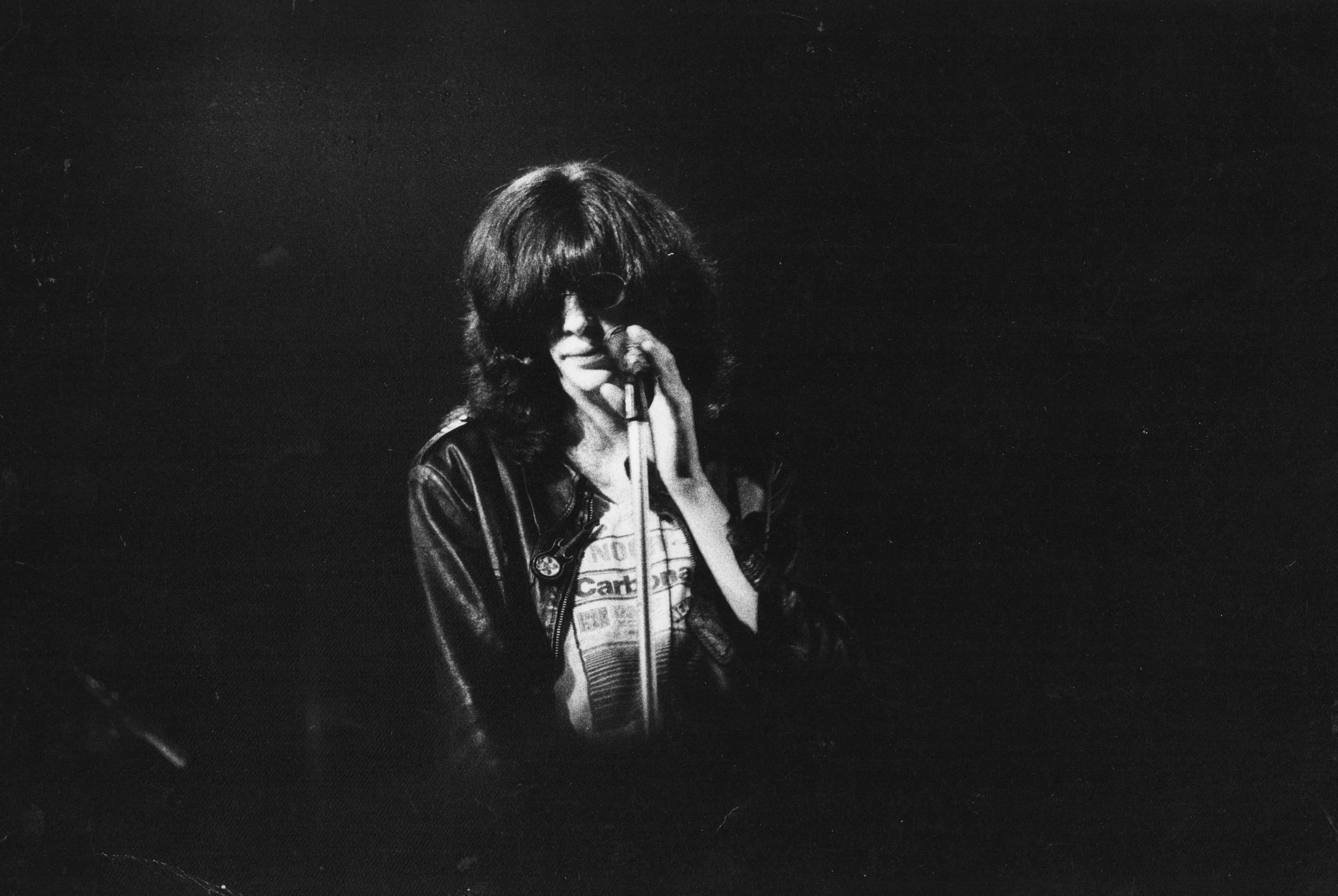 Paul Canty Portrait Photograph - Joey Ramone on Stage in Sunglasses Vintage Original Photograph