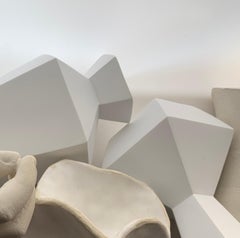 Untitled (2845): still life photograph w/ white vases, bone & cast hands & feet