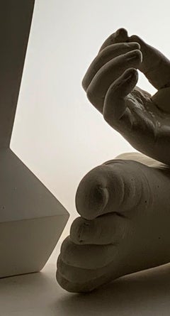 Untitled (2917): still life photograph w/ vases, cast hands & feet, and shadows