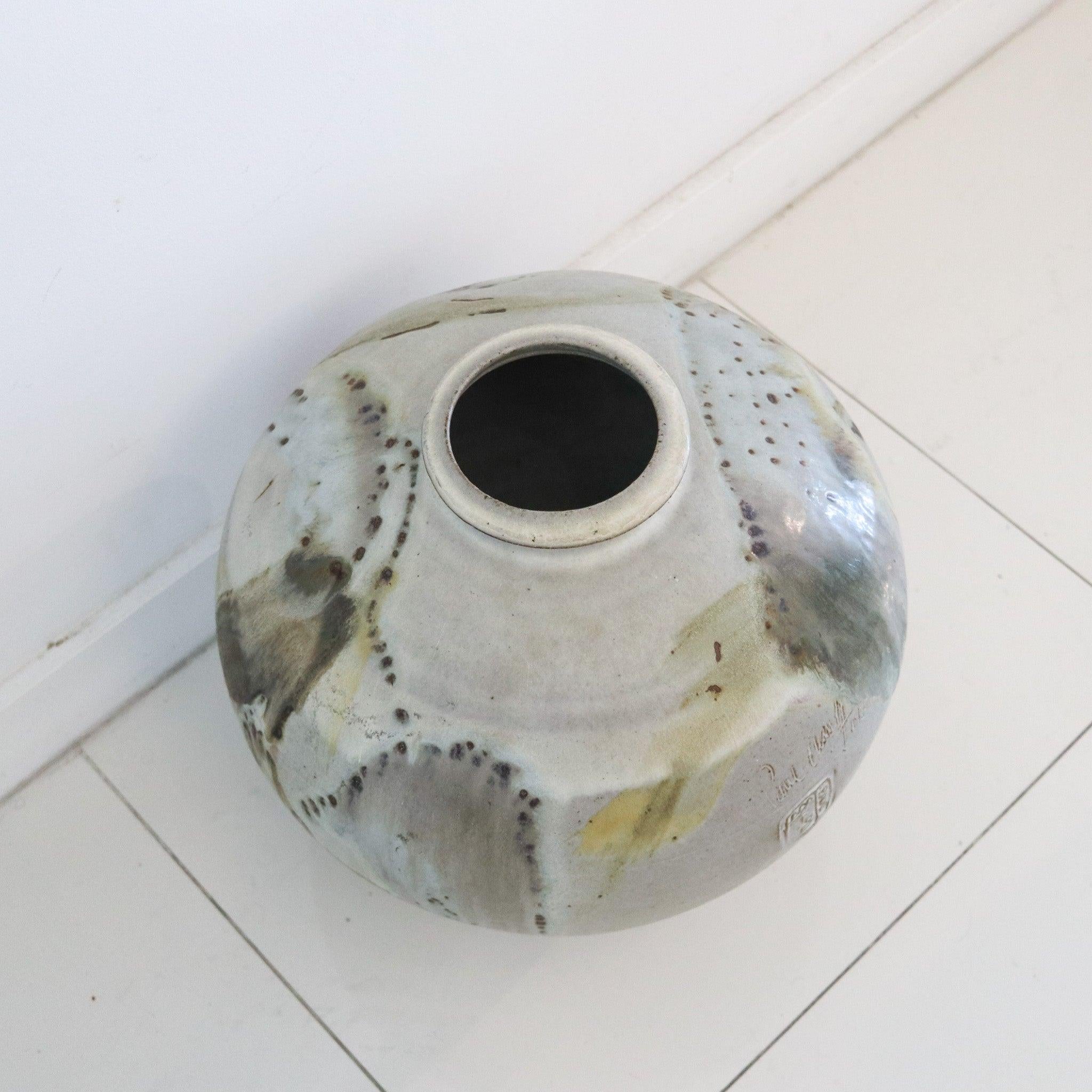 American Art Pottery Dragon Kiln Fired Vase designed by Paul Chaleff.

This is a very large oversized American Art Pottery Vase created by Paul Chaleff, back in 1986. The art pottery vase is exceptional and highly collectable The artist is an