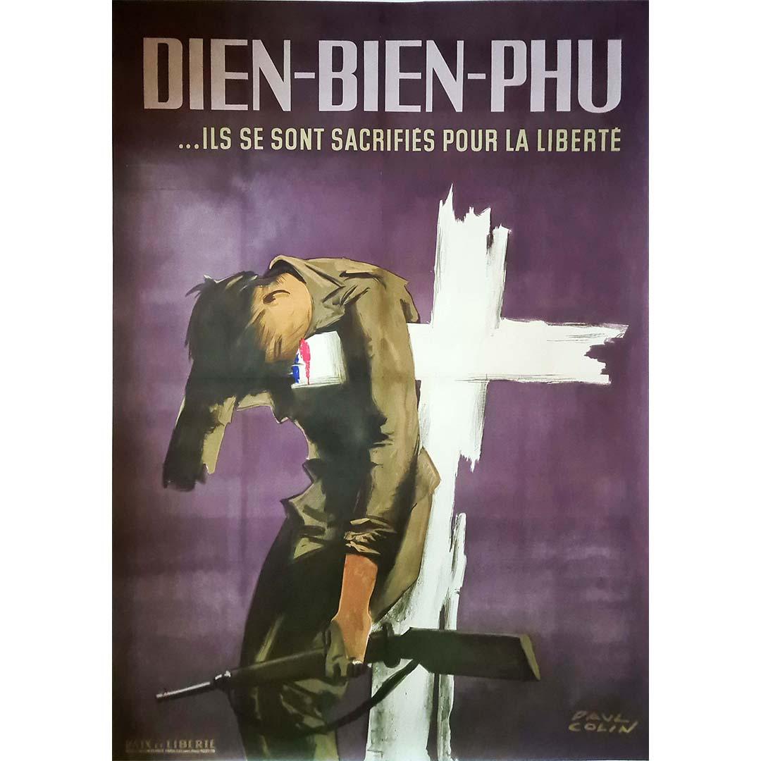 Beautiful historical poster by Paul Colin in honor of the combatants of the battle of Dien-Bien-Phu. Published by Paix et Liberté. A French soldier dies on a white cross like a martyr, still clutching his weapon and with the national colors in his