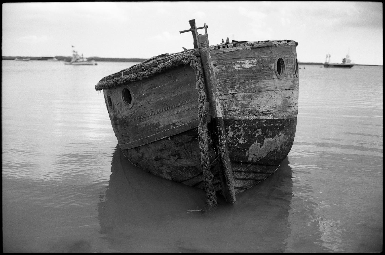 Paul Cooklin Black and White Photograph - Edition 1/10 - Boat, Orford Ness, Suffolk, Silver Gelatin Photograph