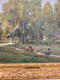 French Impressionist scene of figures walking through a wooded village park.