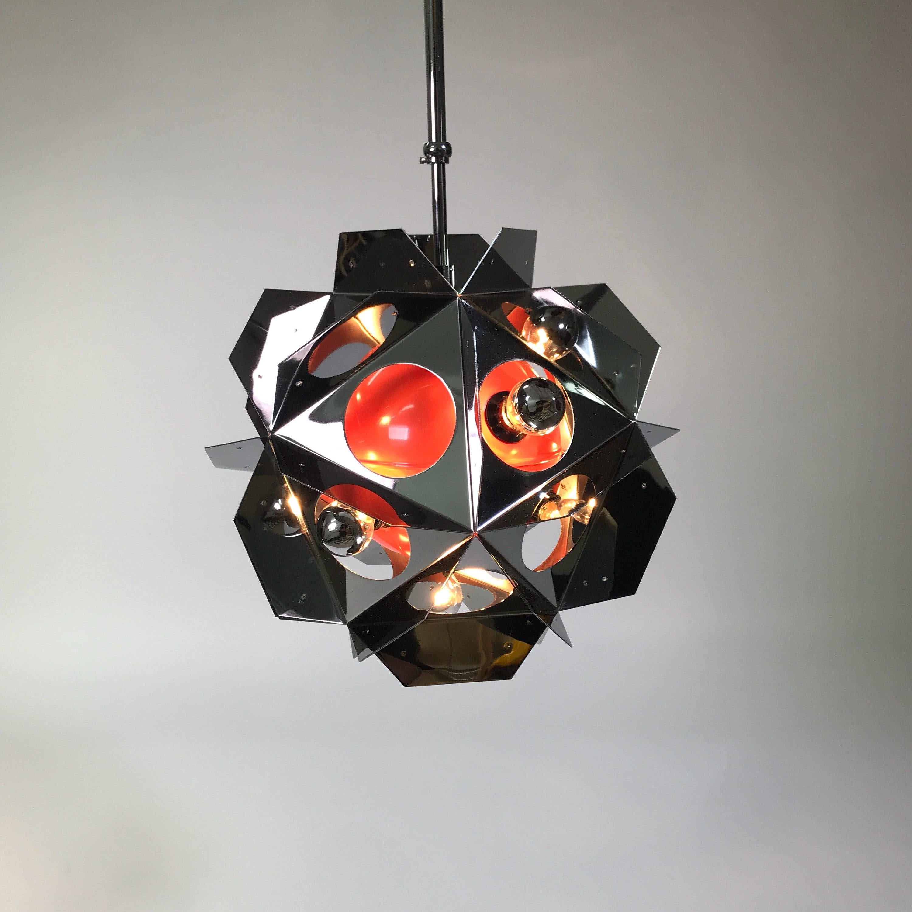 The beautiful and well built ceiling light or chandelier by Paul De Haan is probably designed around start of the century.

“4th floor” is the name of the light and Paul De Haan got inspired by a design hotel in Madrid which has a sharp geometric