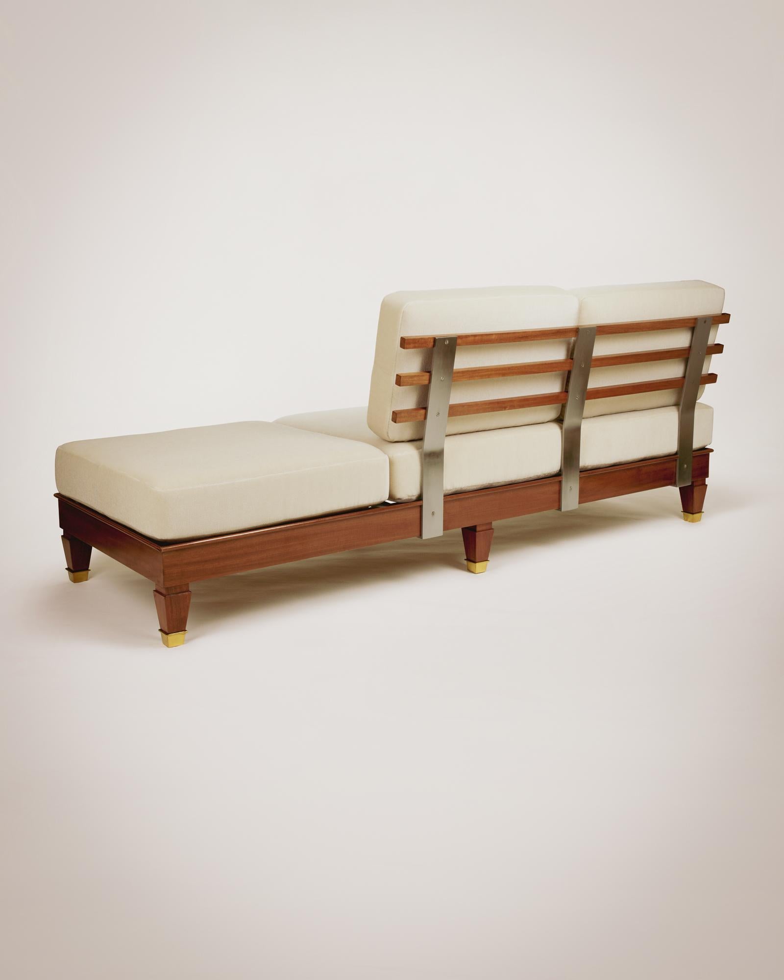 Two banquettes by Paul Dupré Lafon, one two seater and one three seater, with a mahogany frame and gilt bronze hooves, and back rests in polished steel.

Upholstered in beige mohair Maison Pierre Frey velvet.

France, circa 1940

Two seater :