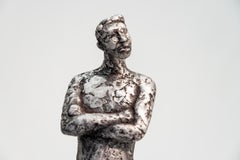 Alexis – ausdrucksstarke, strukturierte, männliche, figurative Skulptur aus Aluminiumguss