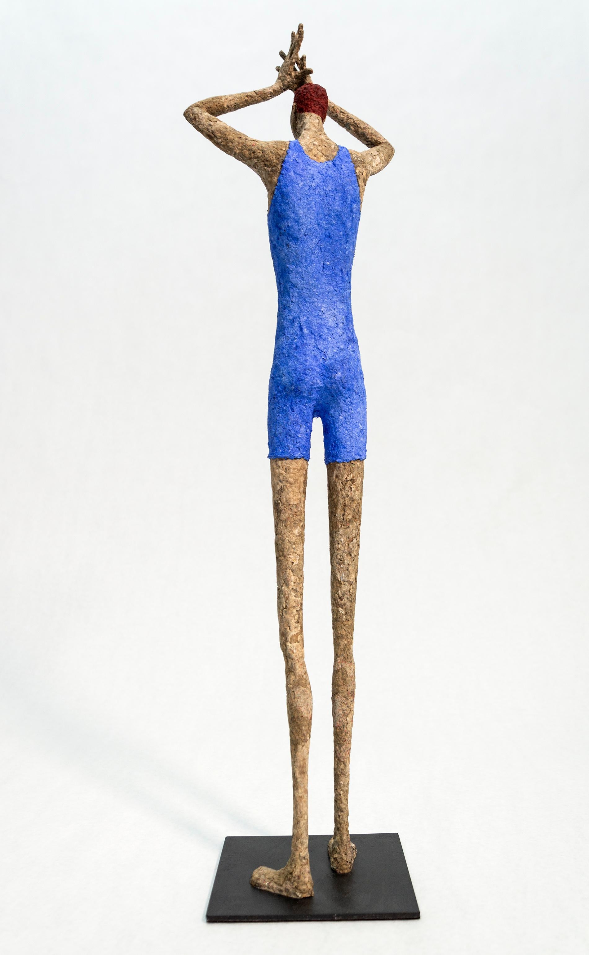 Expressive and engaging, the table-top series of sculptures by Quebec artist Paul Duval depict a variety of personalities; each one unique in detail. Sculpted from paper mache, wire and metal, the posture, colour, and expression of each conveys a