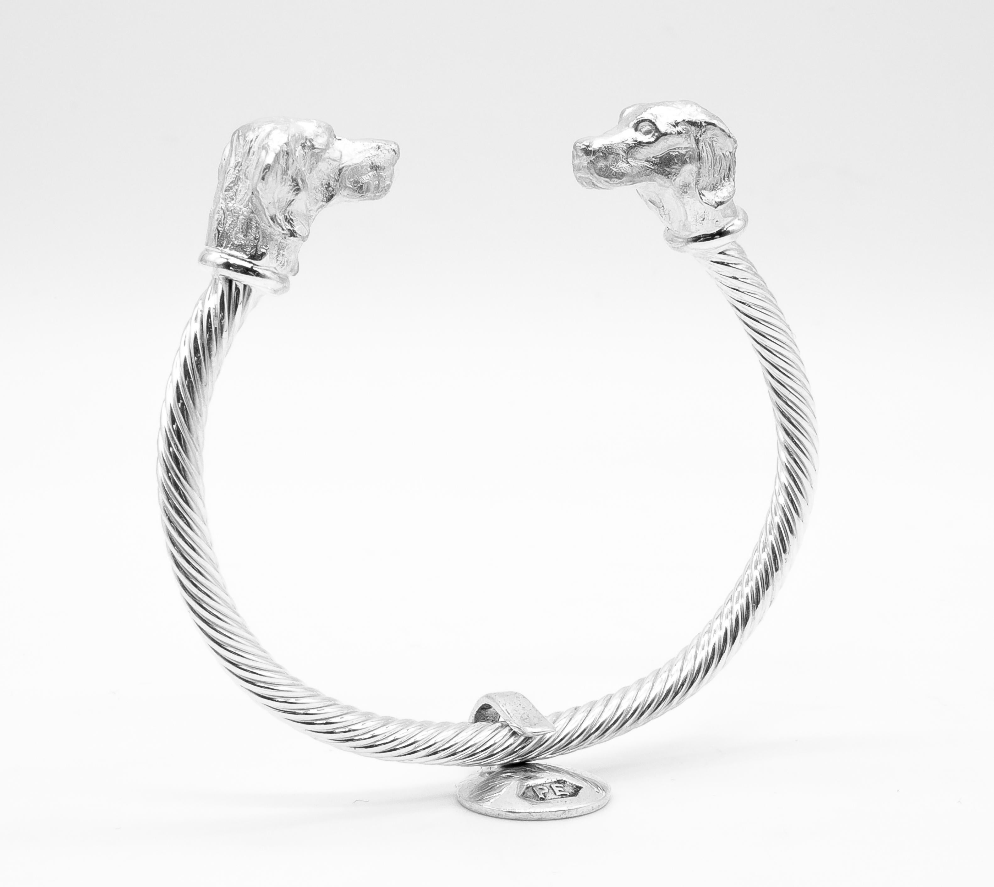 Artisan Paul Eaton Sculpted Pointer Dog Heads on Twisted Bangle in Sterling Silver For Sale