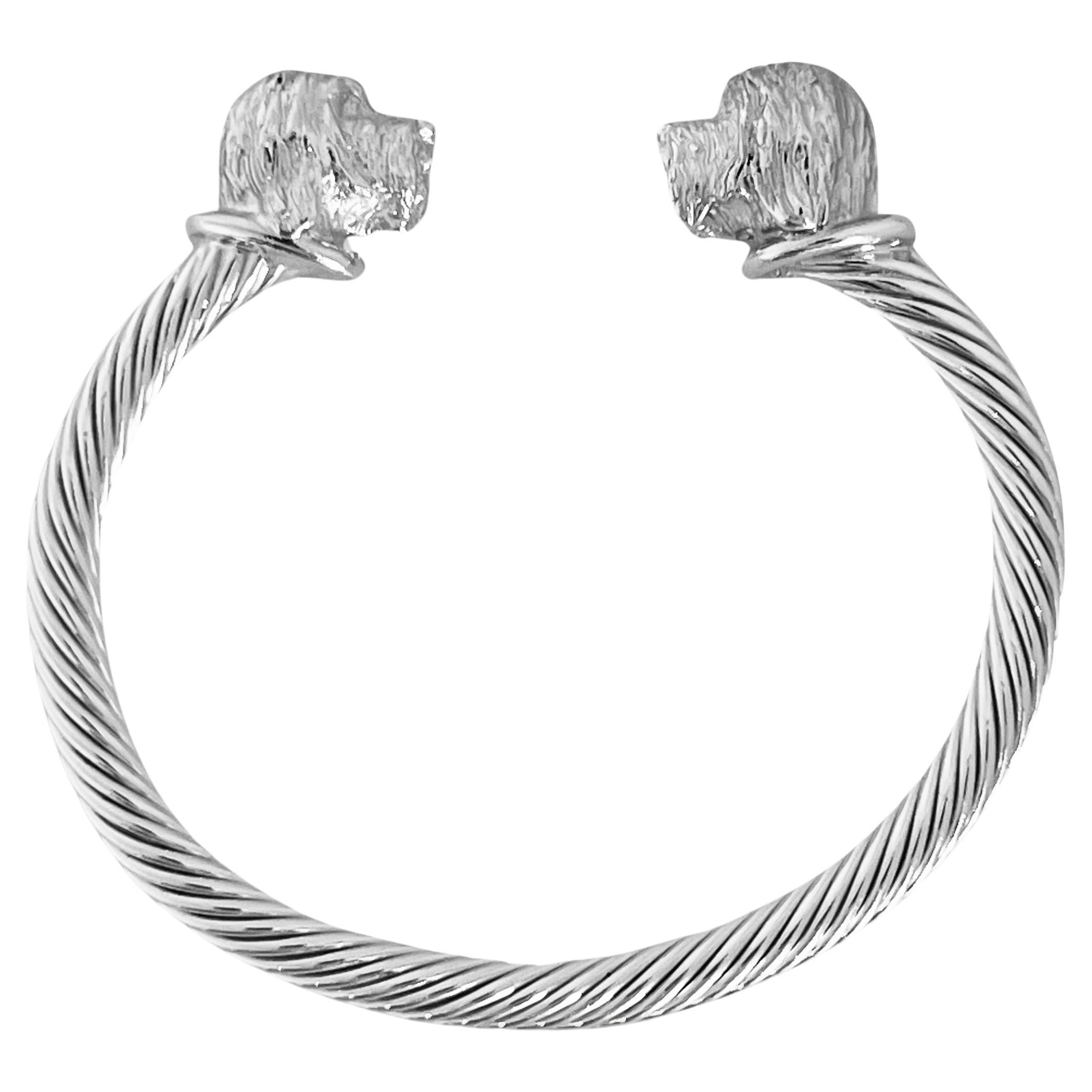 Paul Eaton Sculpted Tibetan Terrier Dog Heads on Twisted Bangle in Sterling For Sale