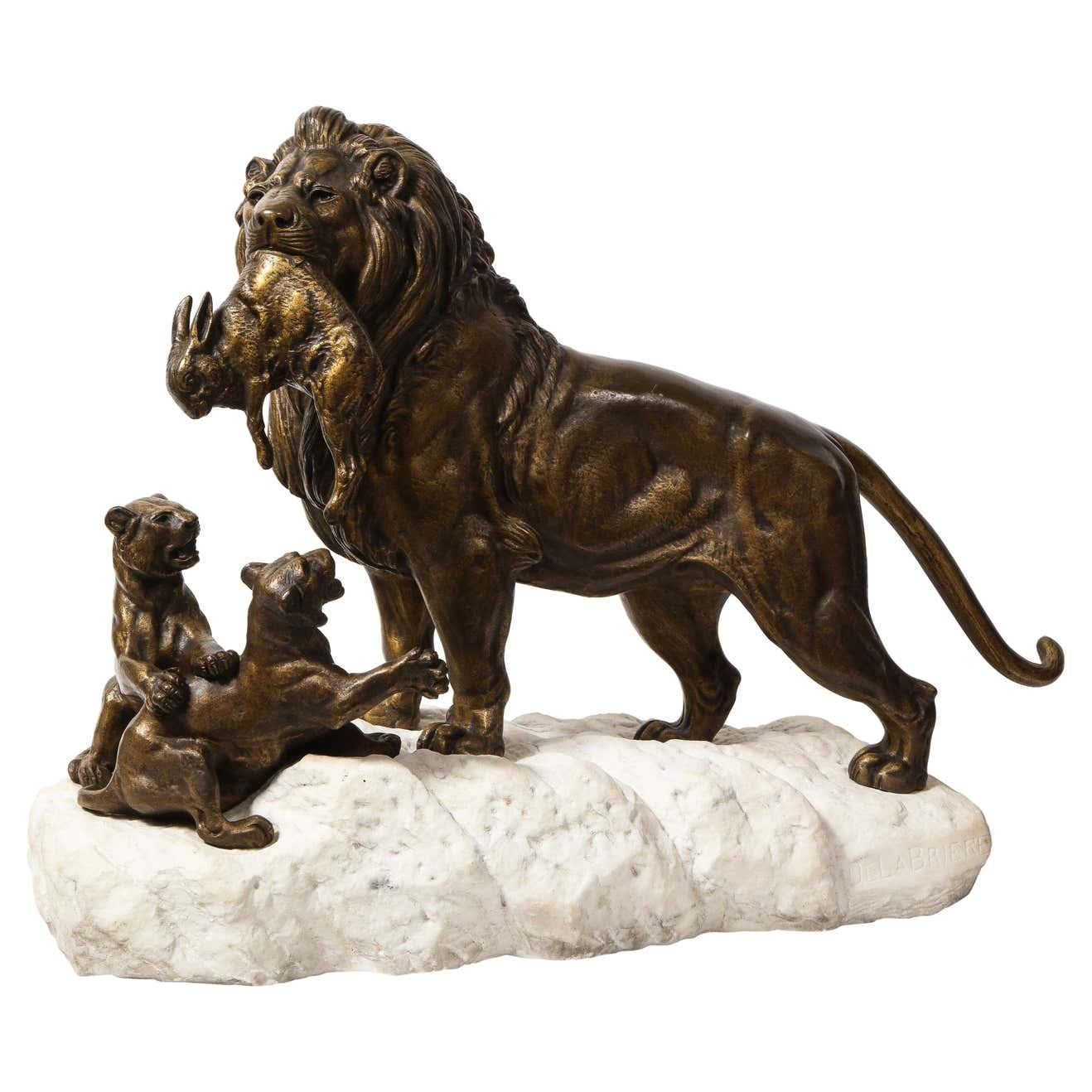Paul-Edouard Delabriere (French, 1829-1923) Large Bronze Sculpture of A Lion with Cubs with A Squirrel as its Prey, on a white marble rock base.  

Very nice quality 19th century sculpture. Signed DELABRIERE on the lower right marble. Perfect for