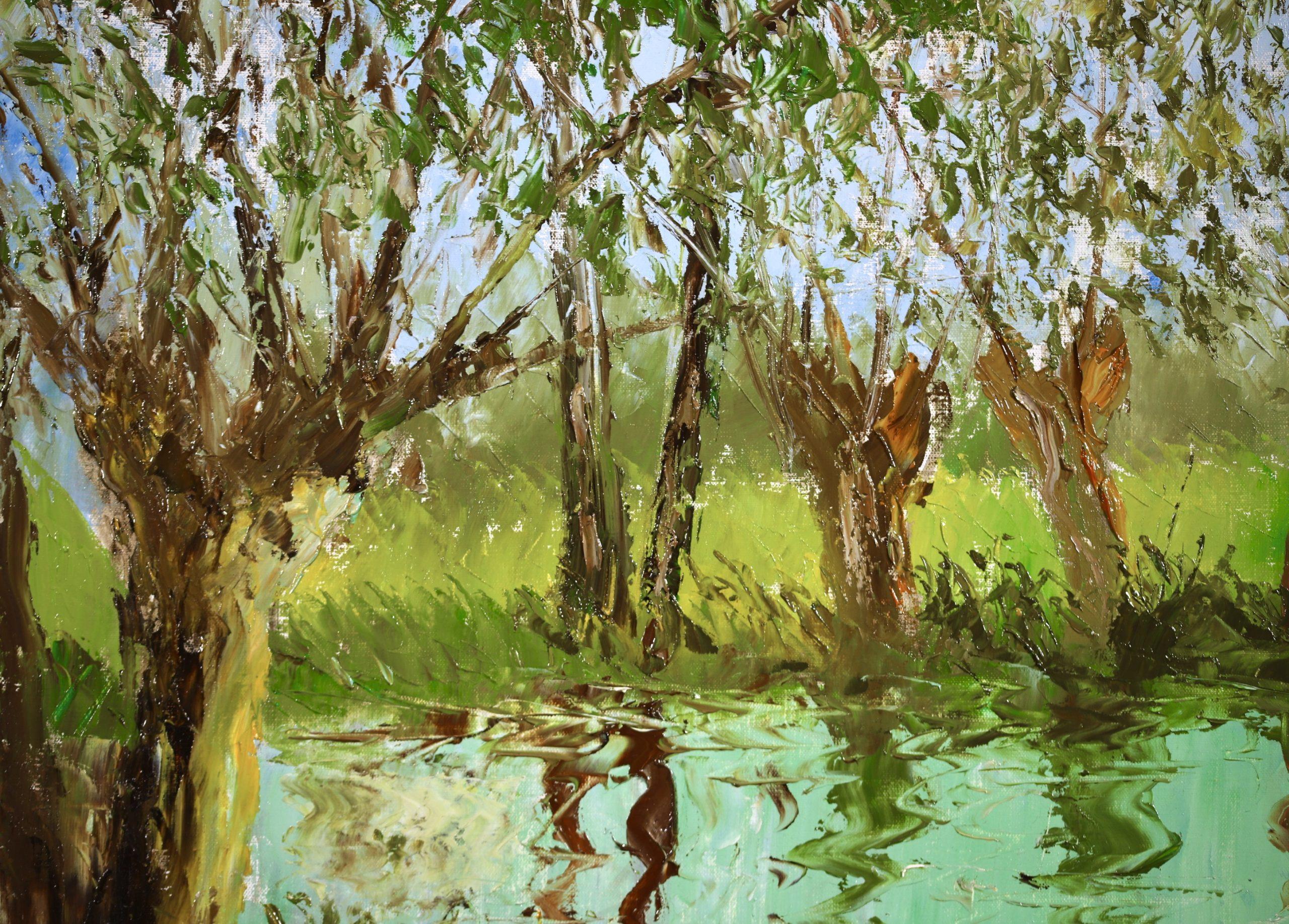 Paisaje al óleo sobre lienzo firmado hacia 1950 por el pintor impresionista francés Paul-Emile Pissarro. La obra representa una vista del río Orne en Normandía, Francia. El cielo azul brillante puede verse a través de las ramas de los árboles que
