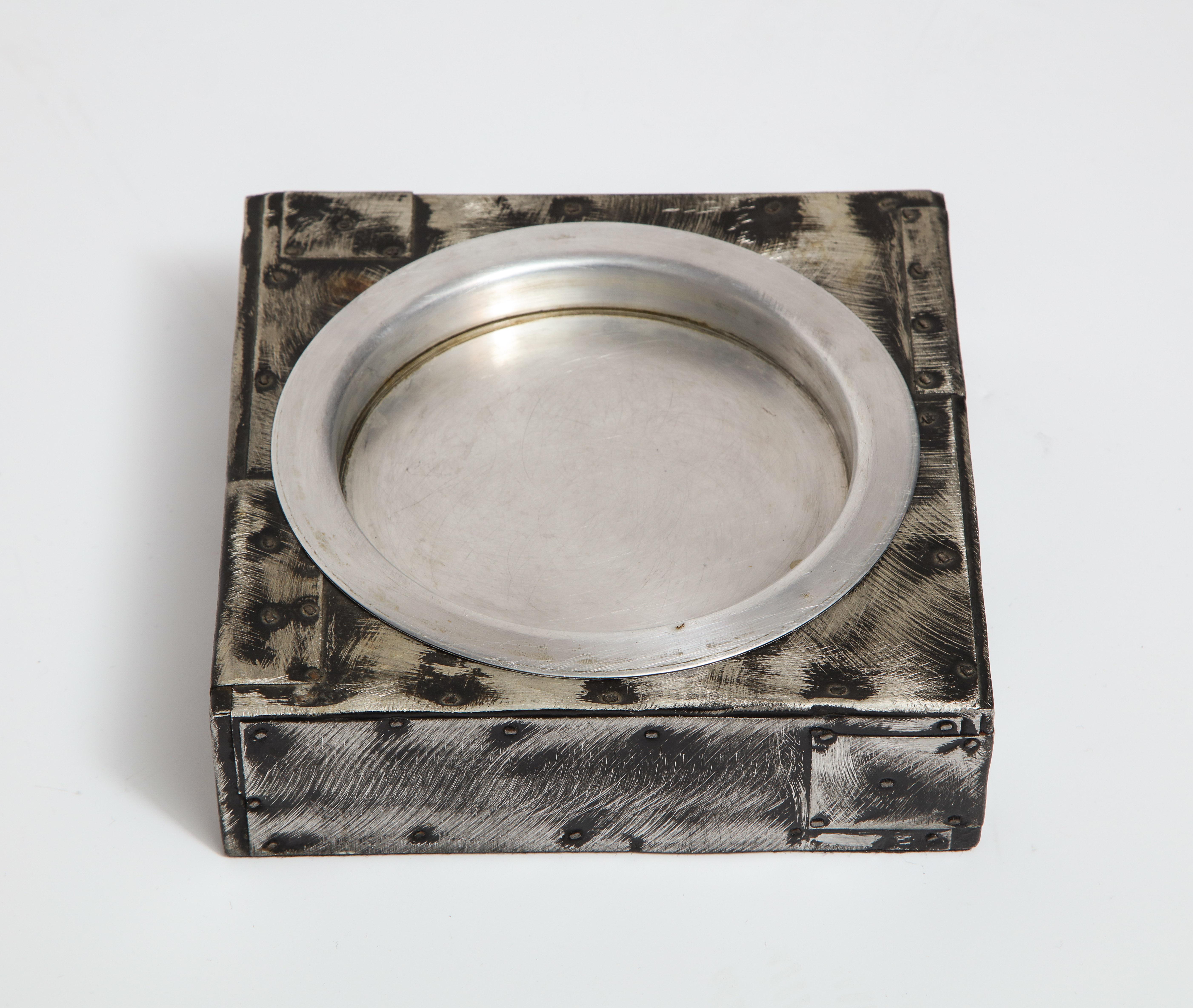 Paul Evans ashtray argente Pewter Patchwork. Square patchwork ashtray in rare argente finish with removable aluminium tray. The underside retains its original black felt. I would like to thank Dorsey Reading, Evans' shop manager, for verifying it's