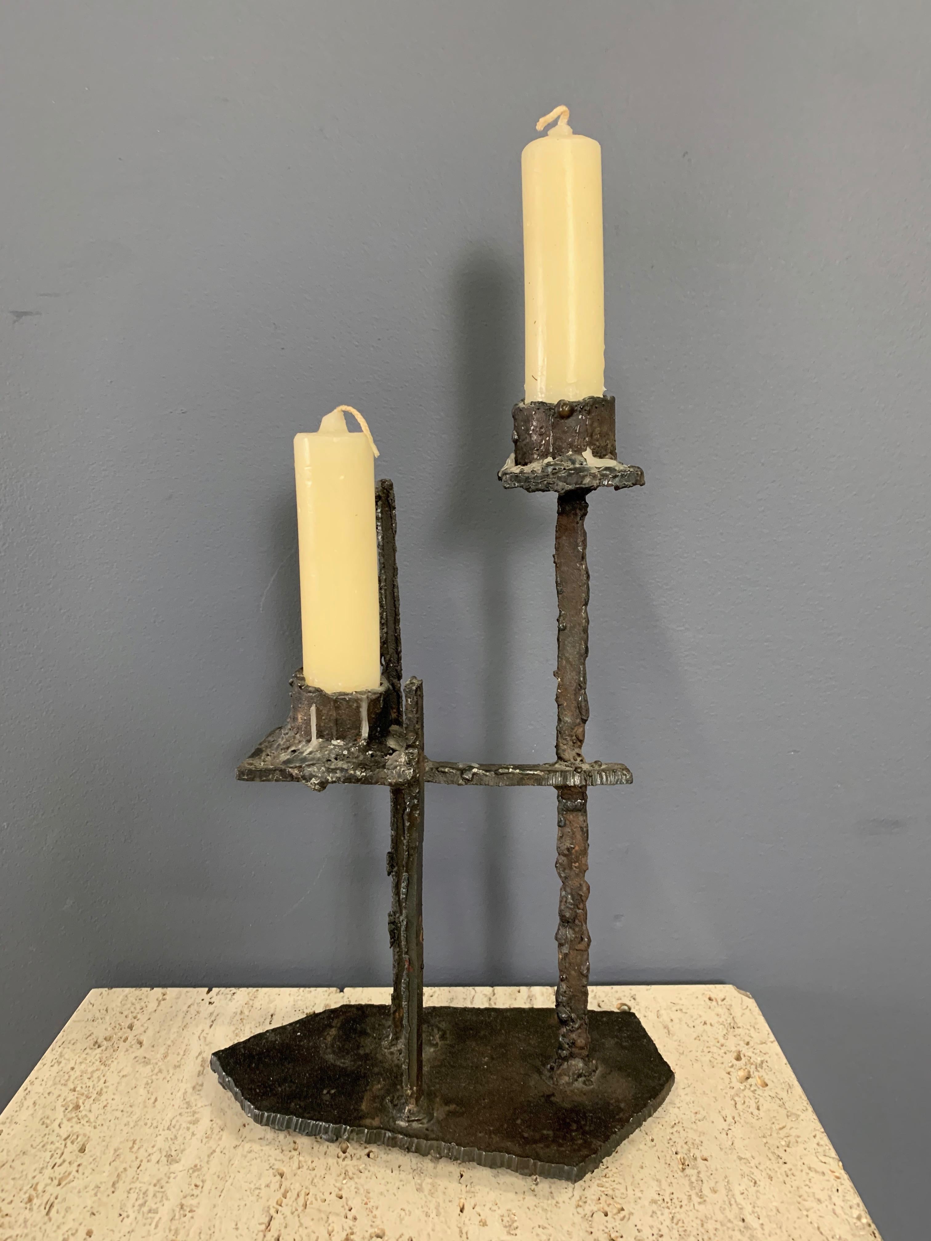 Really nice Brutalist candlestick that is made of welded steel and looks quintessentially brutal!