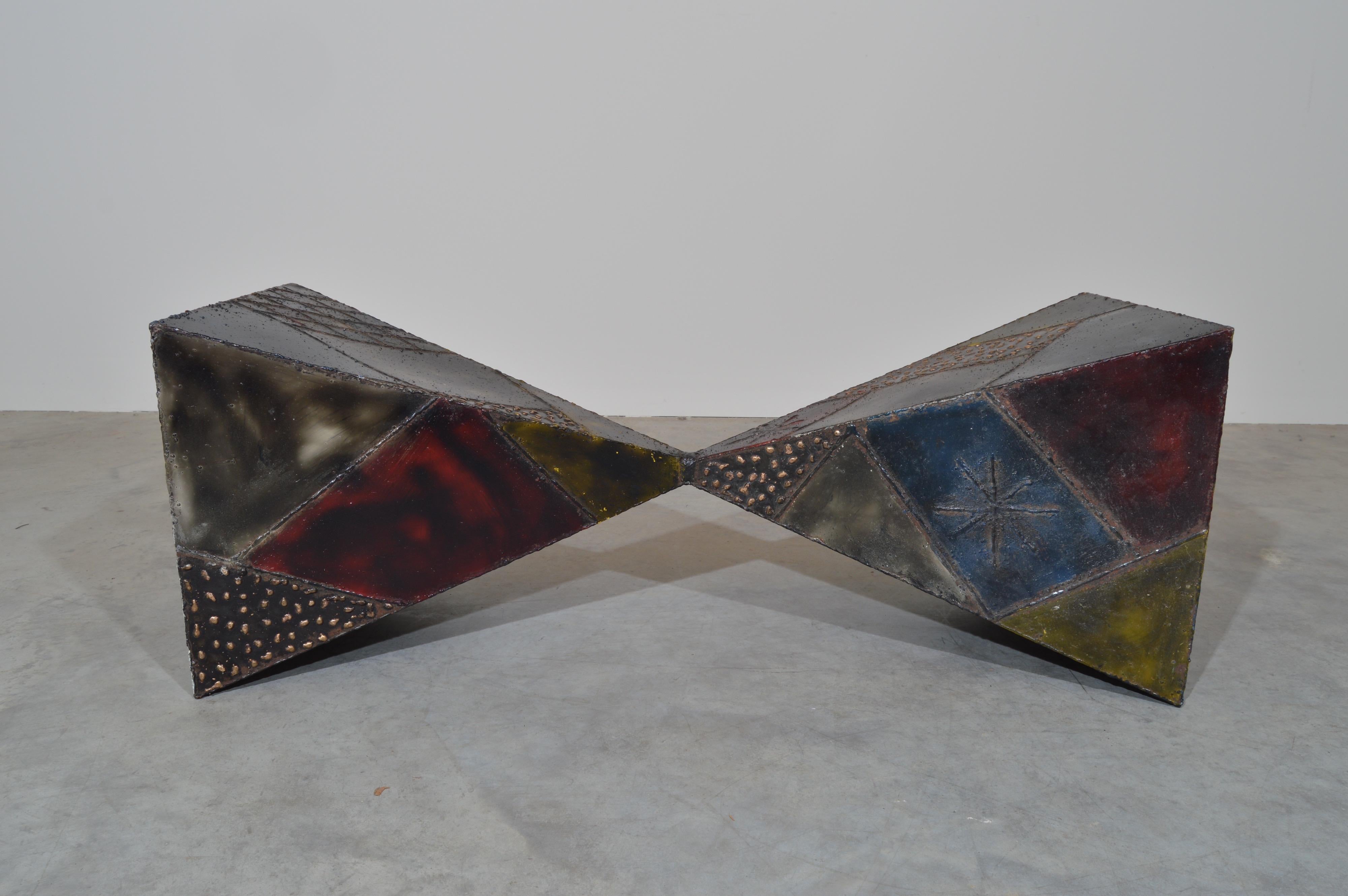 Paul Evans for Directional Brutalist welded steel coffee table base having abstract geometric pattern designs colored with acid pigments in red, blue and yellow. 
Signed PE72
In phenomenal condition. 
Part of a collection that decorated an