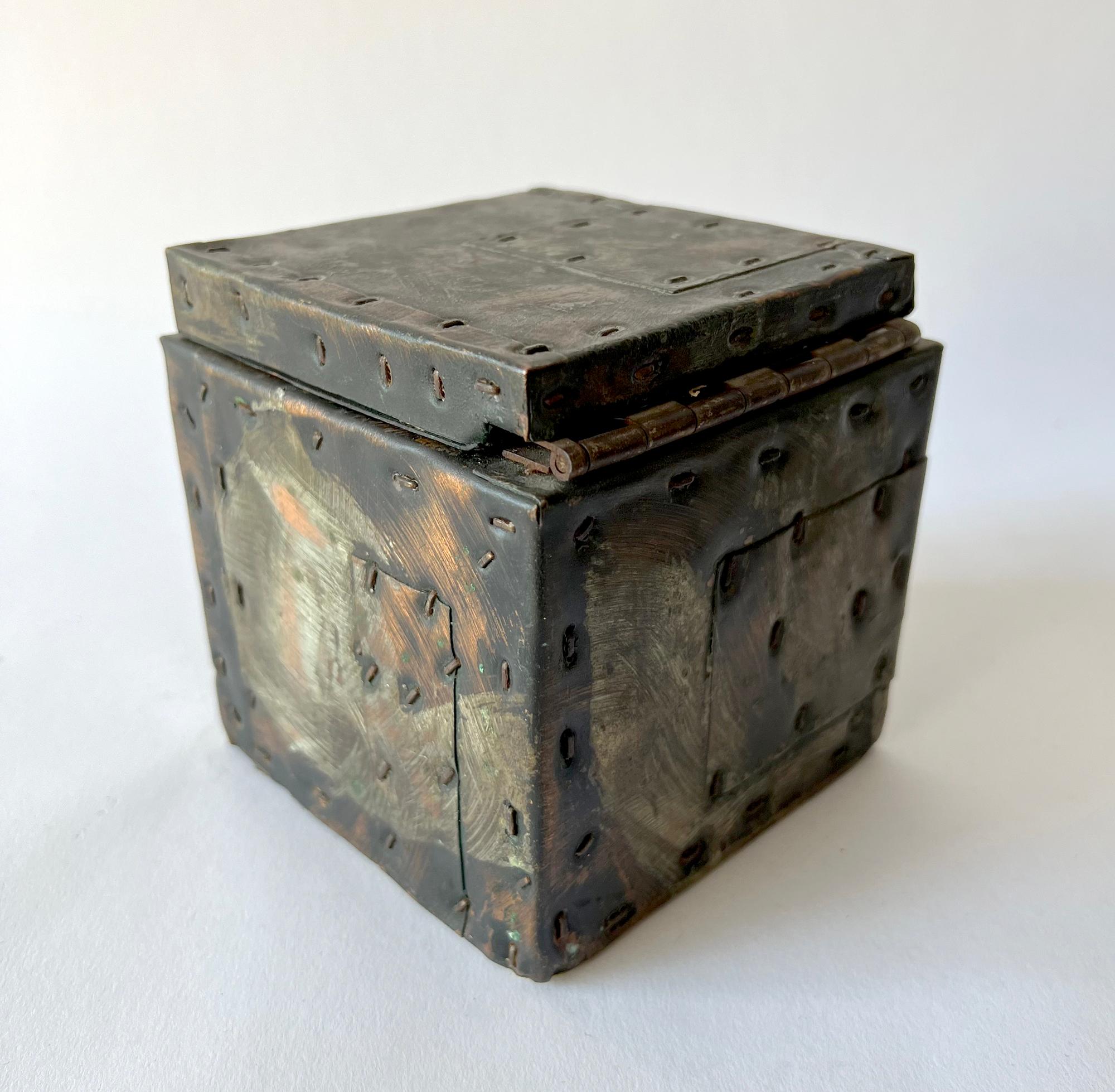 Patinated copper, steel and brass handmade cube box created by Paul Evans (1931-1987). Box measures 5