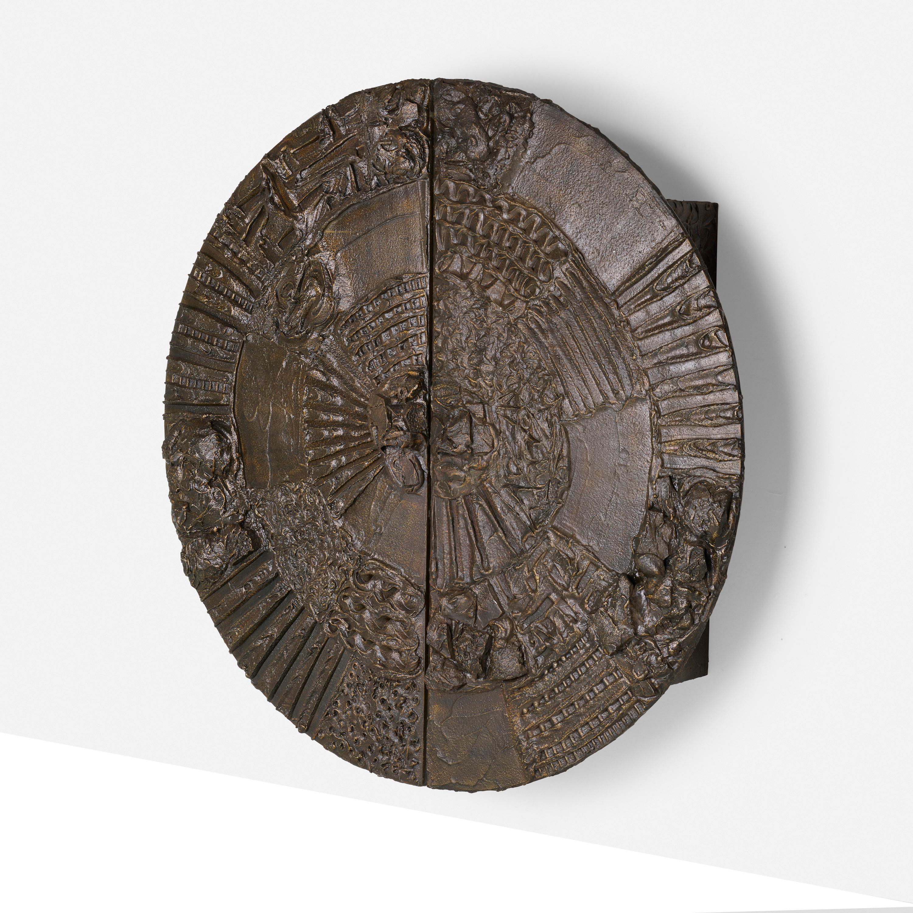  Paul Evans Brutalist sculpted bronze wall-mounted disc bar cabinet, 
Model PE-122.
This iconic bar features two doors concealing one drawer, one cabinet with key and two adjustable shelves.
Exceptional abstract forms, solid volumes and powerful