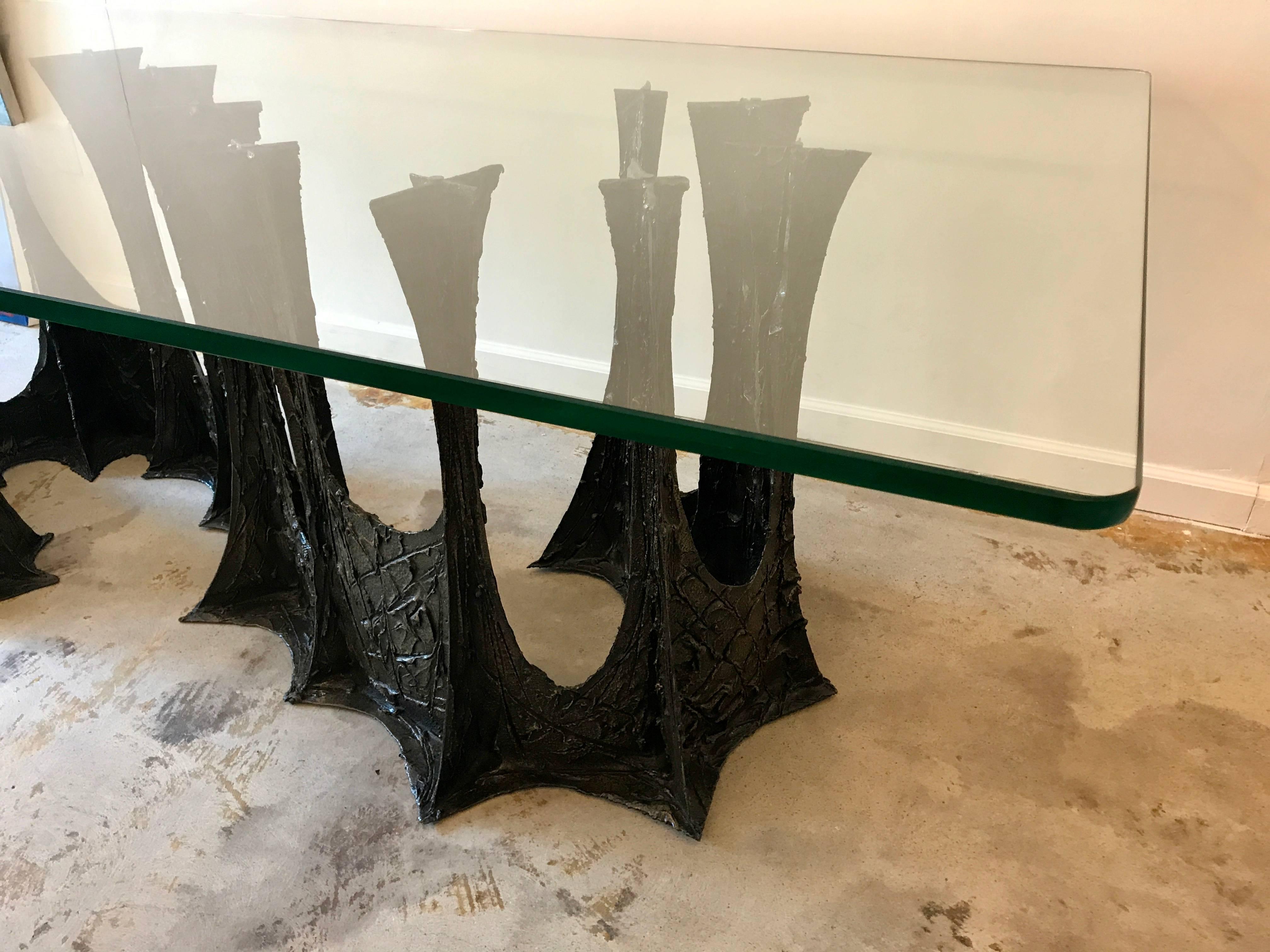 A spectacular and very rare sculptural brutalist Paul Evans stalagmite base dining table, model PE102, signed PE70. The bronze and resin composite base is in extraordinary condition and shows beautifully with its deep dark bronze patina. The table