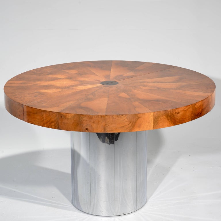 Amazing vintage Paul Evans Cityscape burl wood and stainless steel dining table. Starburst design. Includes one table leaf extension which is 20 in wide.
 