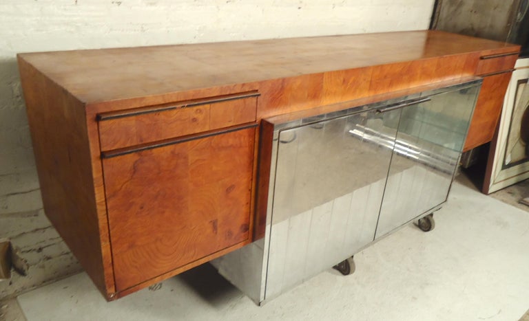 Stunning burl wood patchwork credenza with chrome cabinet. Floating style sideboard with drawers, chrome cabinet with adjustable shelves.

(Please confirm item location - NY or NJ - with dealer).
 