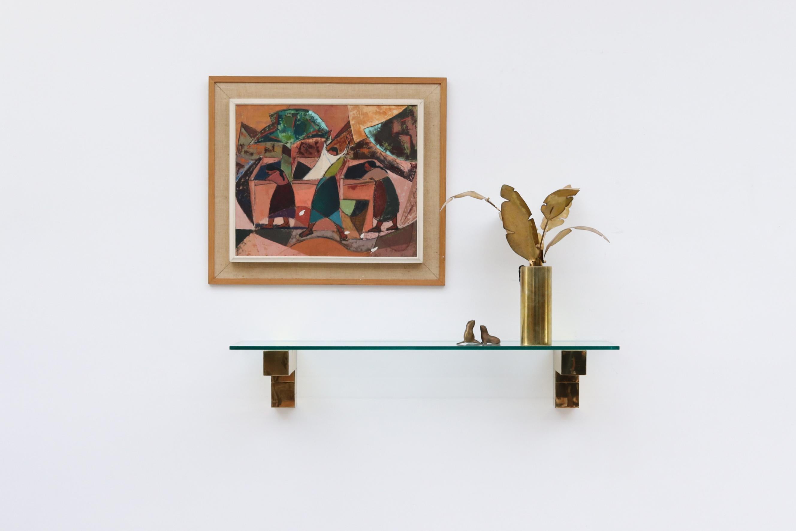 Paul Evans Cityscape with brass holders and glass shelf. In original condition with visible wear, consistent with age and use. Another available in chrome.