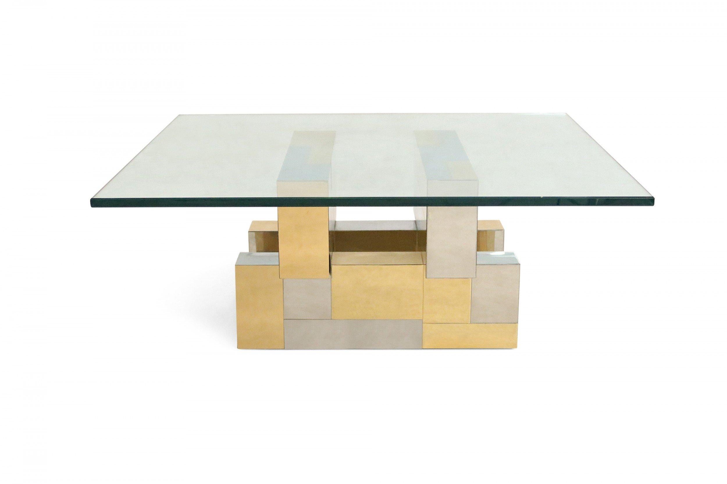 American Brutalist square glass coffee table with a mixed metal gold and silver geometric base. (PAUL EVANS, 