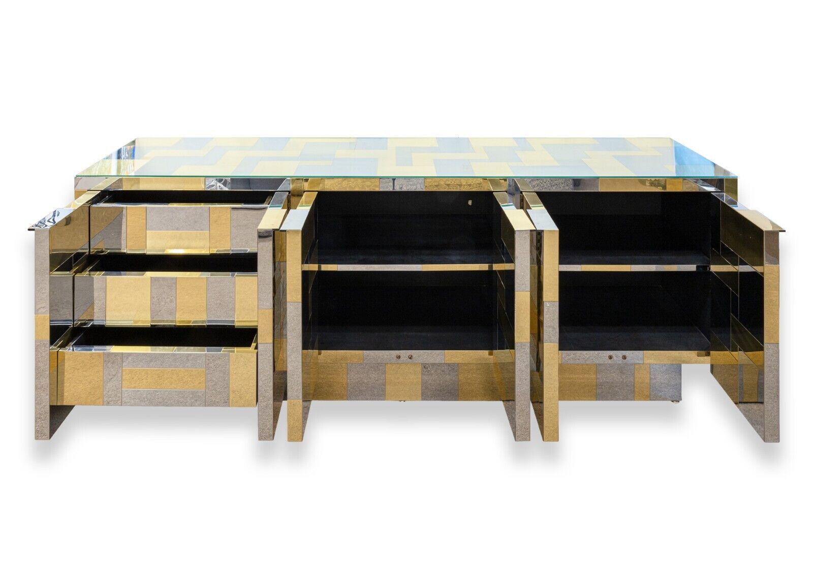 A Paul Evans Cityscape chrome & brass credenza for Directional. This monumental piece from Paul Evans is from his legendary Cityscape series for furniture manufacturer Directional. This luxurious line of pieces are best known for their modern,