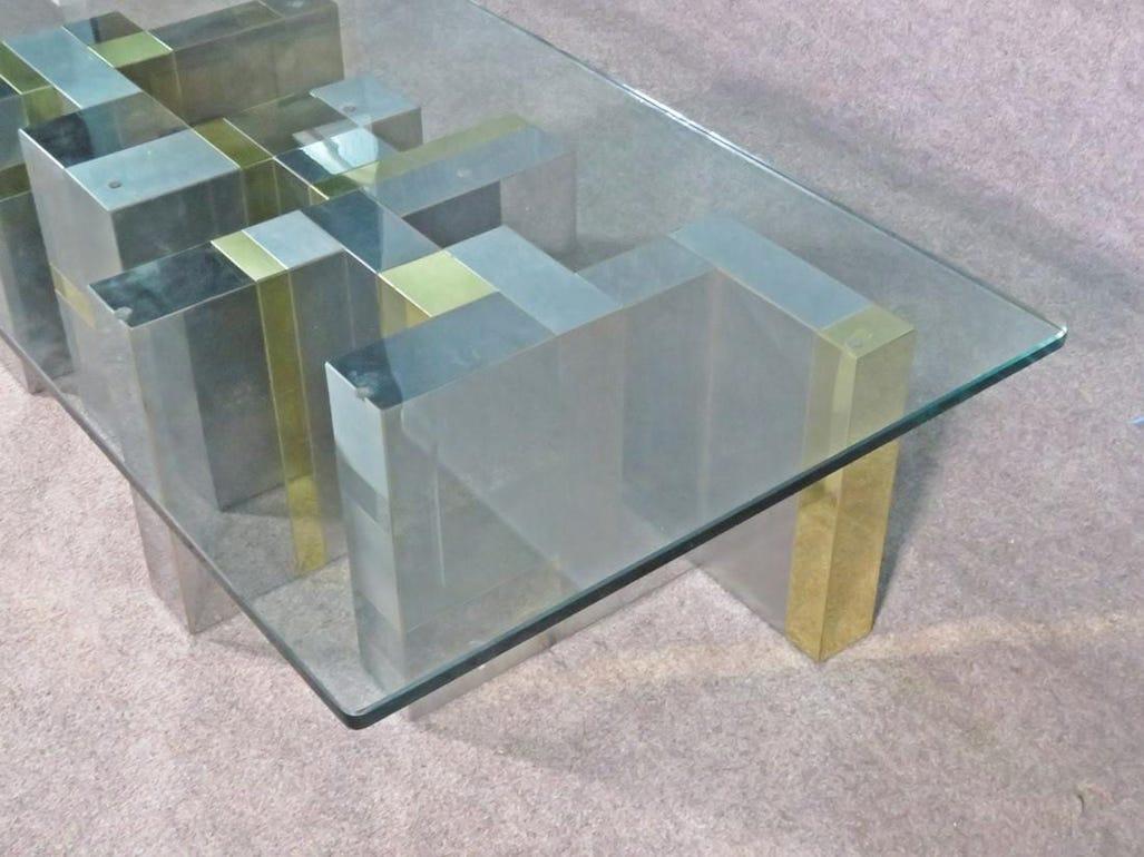 Vintage modern Paul Evans Cityscape coffee table featuring a chrome-plated base and thick glass top.

Please confirm item location (NY or NJ).