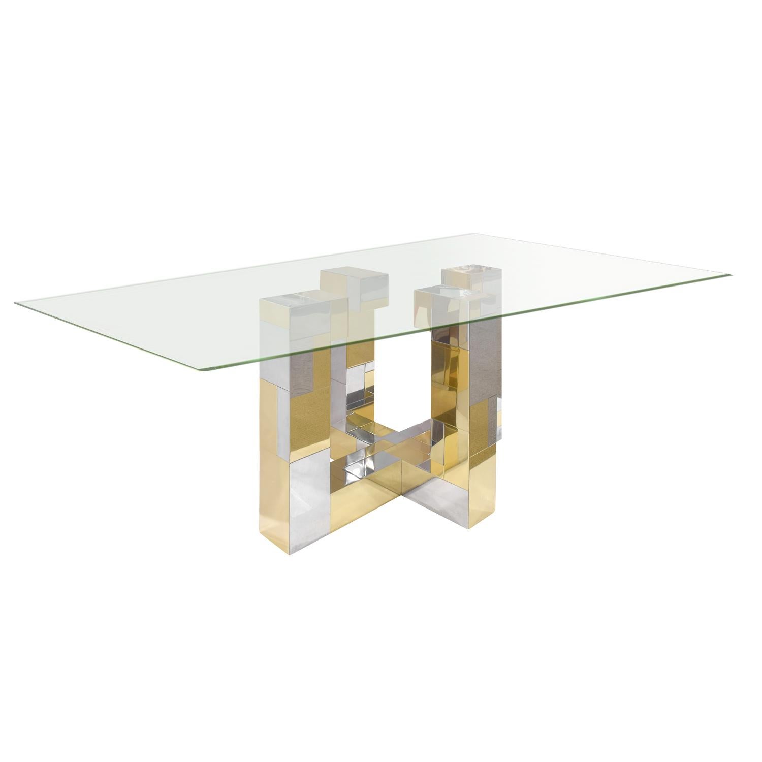 Dining table with base in tessellated chrome and brass with thick glass by Paul Evans for Directional Furniture, Cityscape Collection, American, 1970s. This is a rare form.

Base dimensions:

W 37 inches
D 24 inches 
H 29 inches.