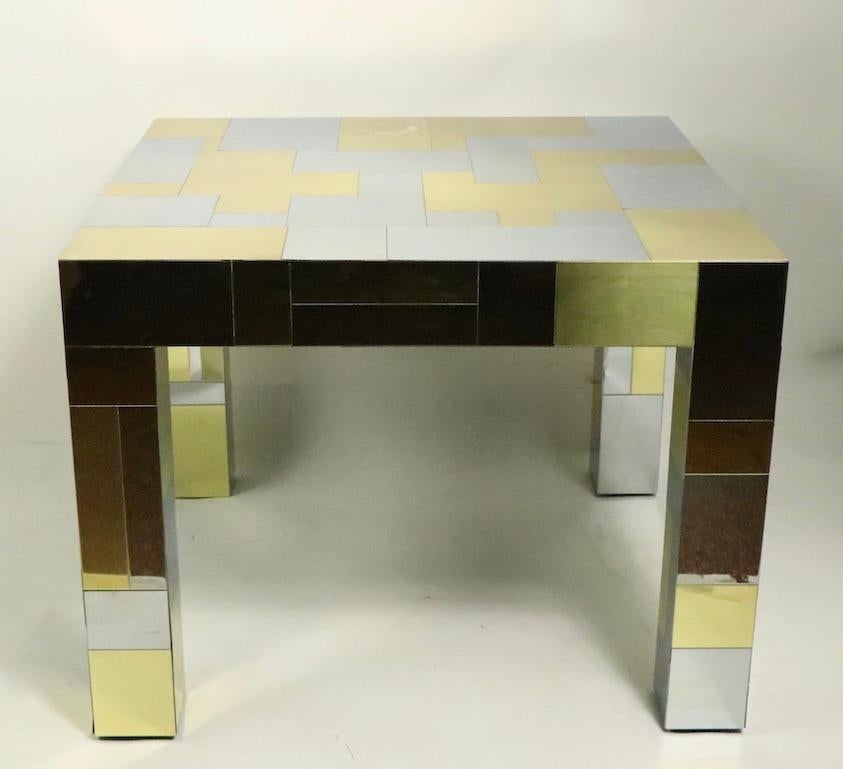 Nice signed example from the Cityscape series by Paul Evans for Directional. Hard to find form, usable as a game, side, or occasional table. This table is in good, original condition, however does shows some cosmetic wear, notably a ring on the top,