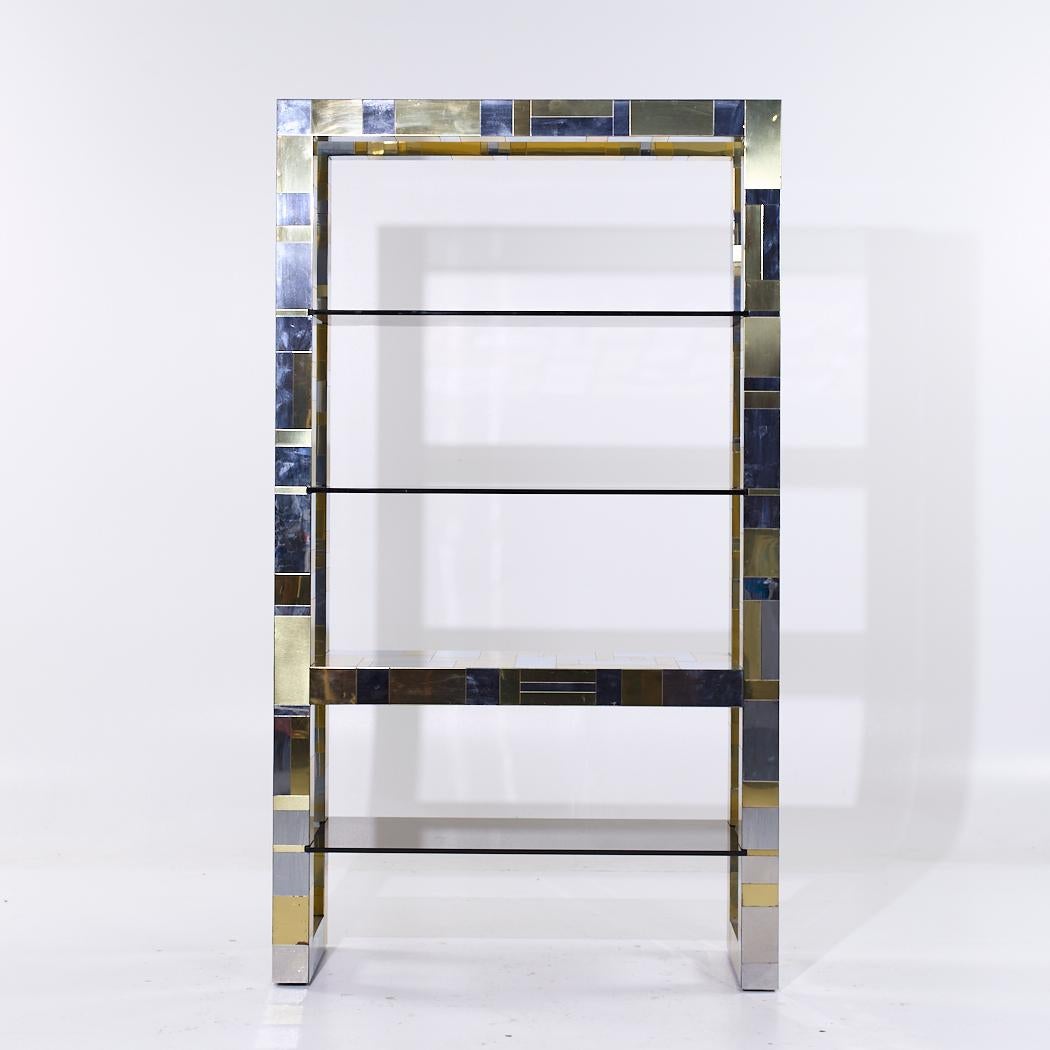 Paul Evans Cityscape Mid Century Brass and Chrome Freestanding Bookcase

This bookcase measures: 48 wide x 18 deep x 84.5 inches high

We take our photos in a controlled lighting studio to show as much detail as possible. We do not Photoshop out