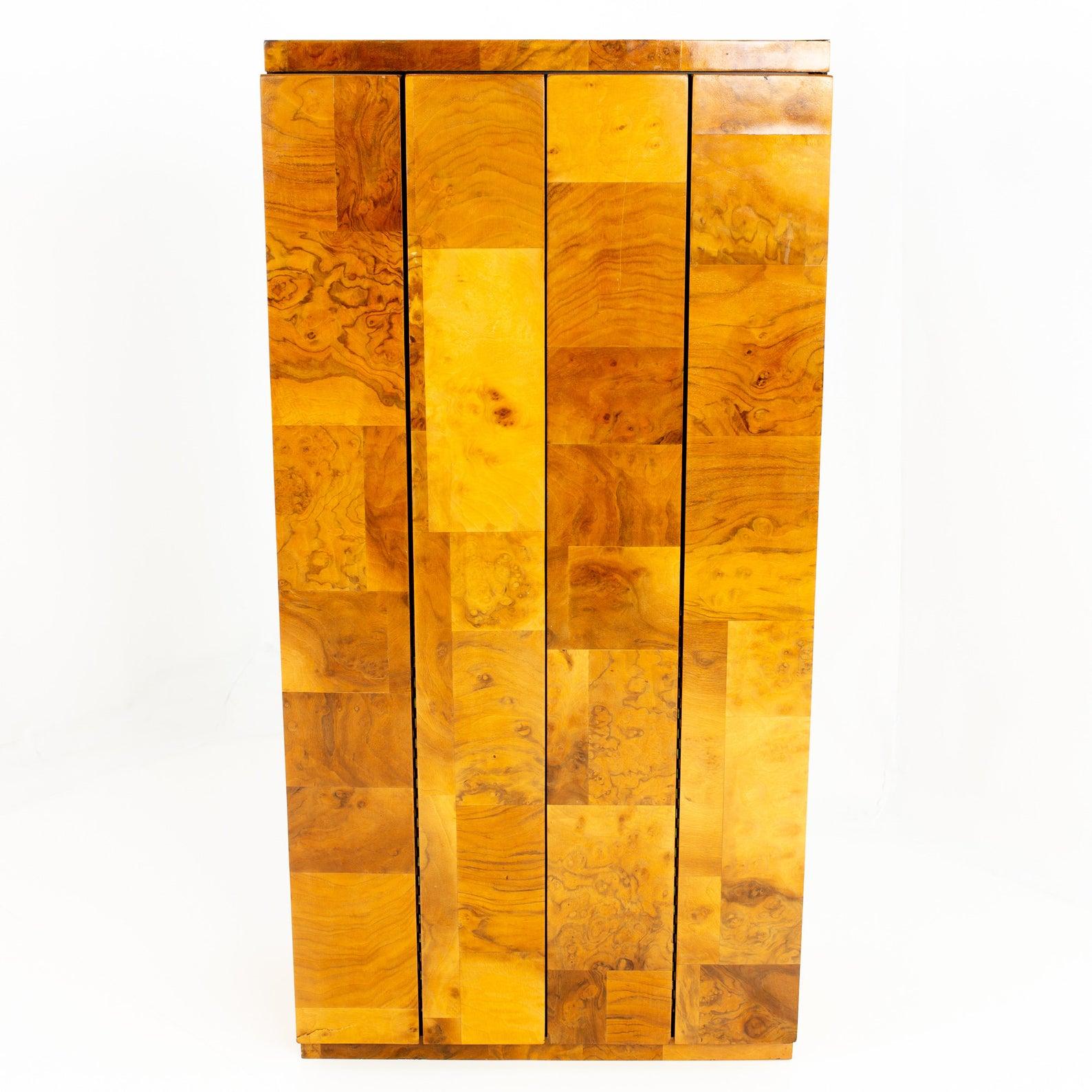 Paul Evans cityscape Mid Century burl wood floating display cabinet 
Measures: 24.5 wide x 13.75 deep x 48.25 inches high 

This price includes getting this piece in what we call restored vintage condition. That means the piece is permanently fixed