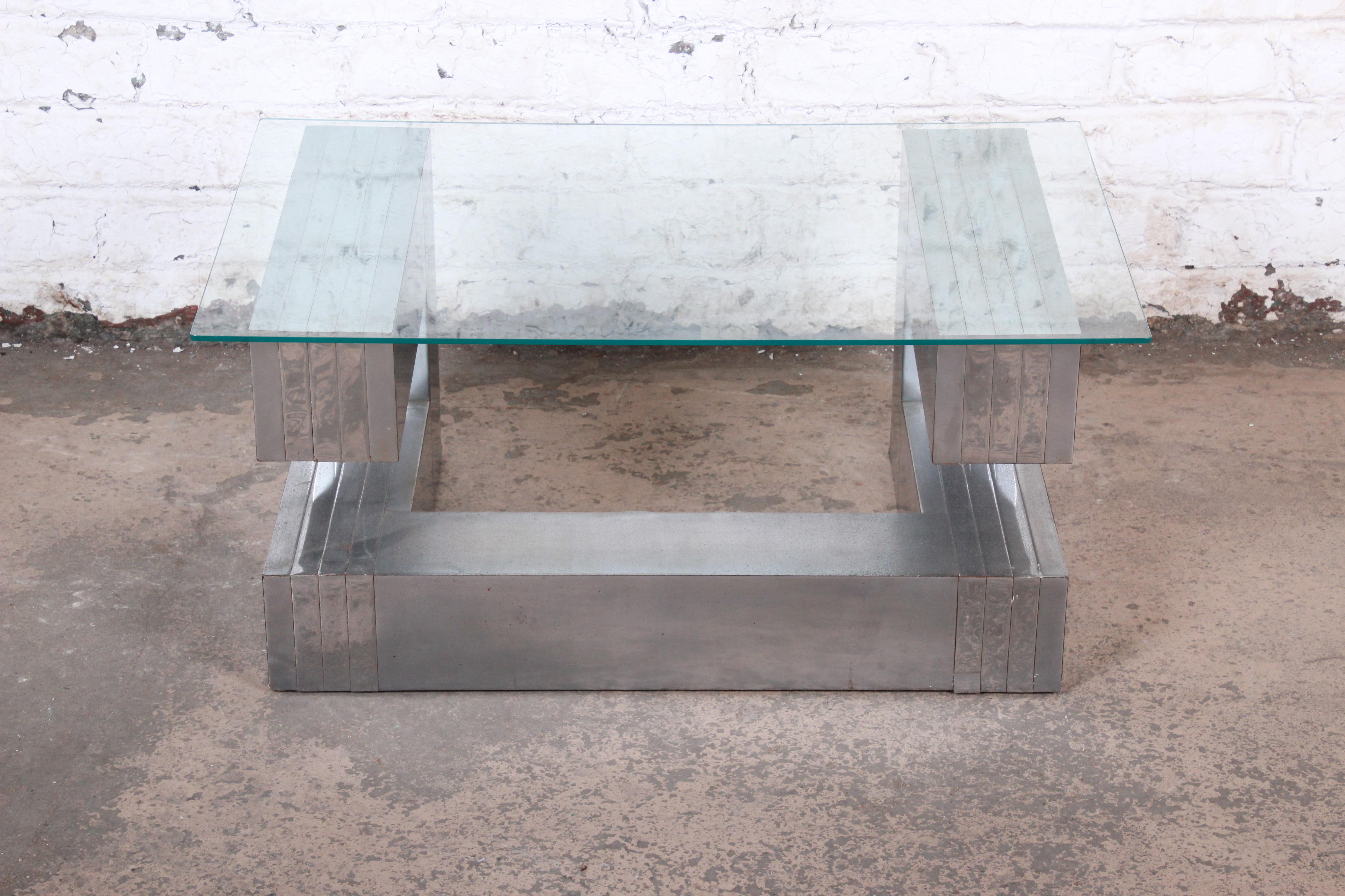 A gorgeous Mid-Century Modern cantilevered coffee or side table

In the style of Paul Evans for Directional 